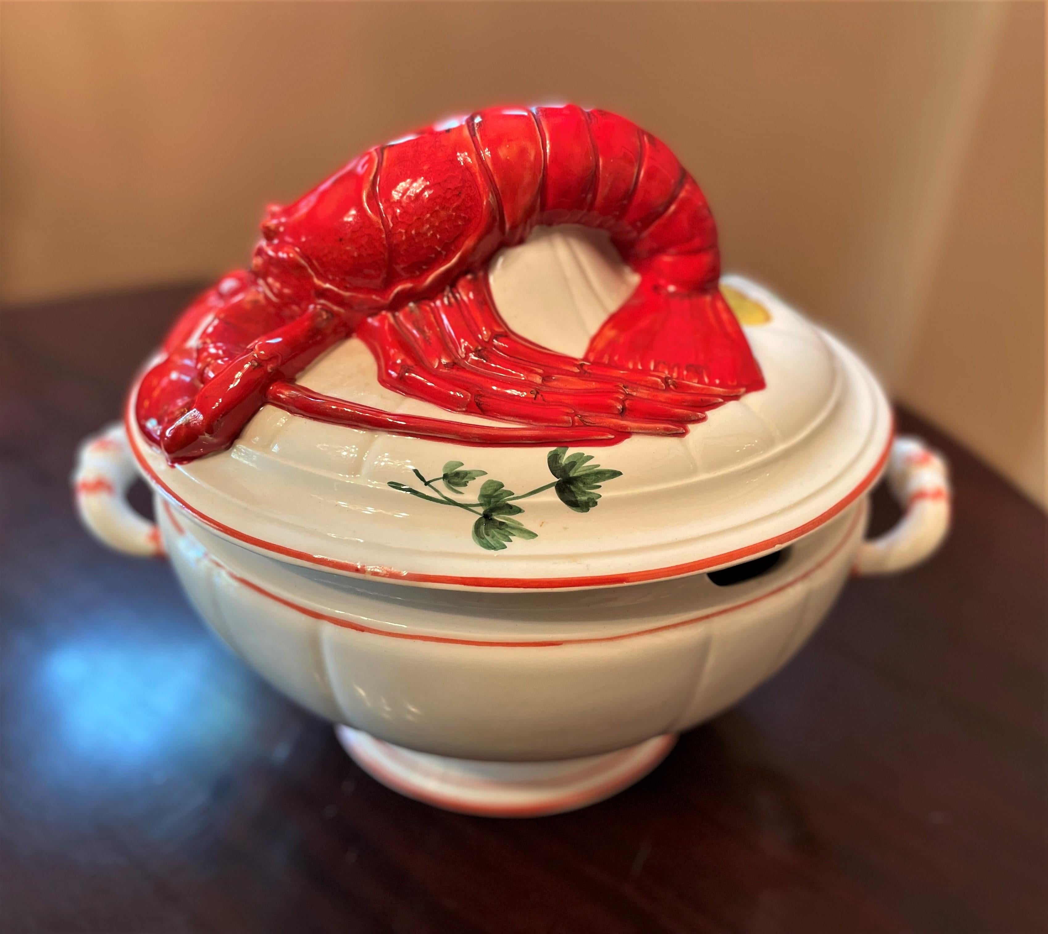 A rare one-of-a-kind find! This lobster-topped soup tureen makes me smile. I'm ready to drop everything and gather my family and friends for a hearty dinner al fresco.

This is an artisanal piece for sure -- hand-glazed ceramic from Italy and
