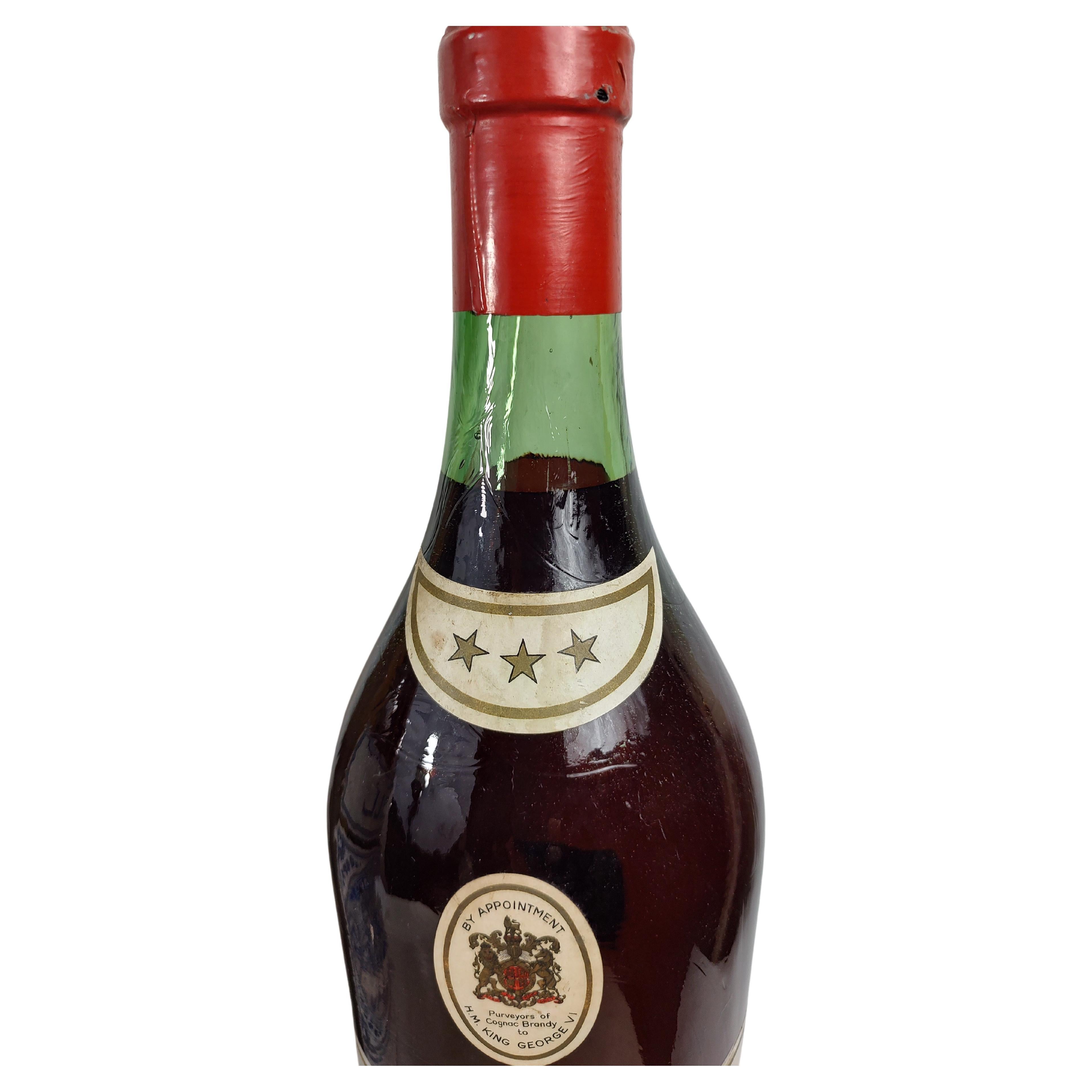 Fabulous display bottles hand blown with painted interior that imitates a full bottle of booze. In very good condition with minimal wear. Can be parcel posted.