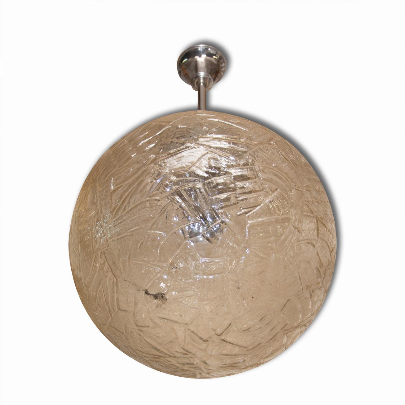 Midcentury Czechoslovak large round pendant lamp with a frozen glass shade. Made in the 1960s. An excellent quality piece, it features a frozen glass shade and chromed rod. In very good vintage condition, consistent with age and use. Original