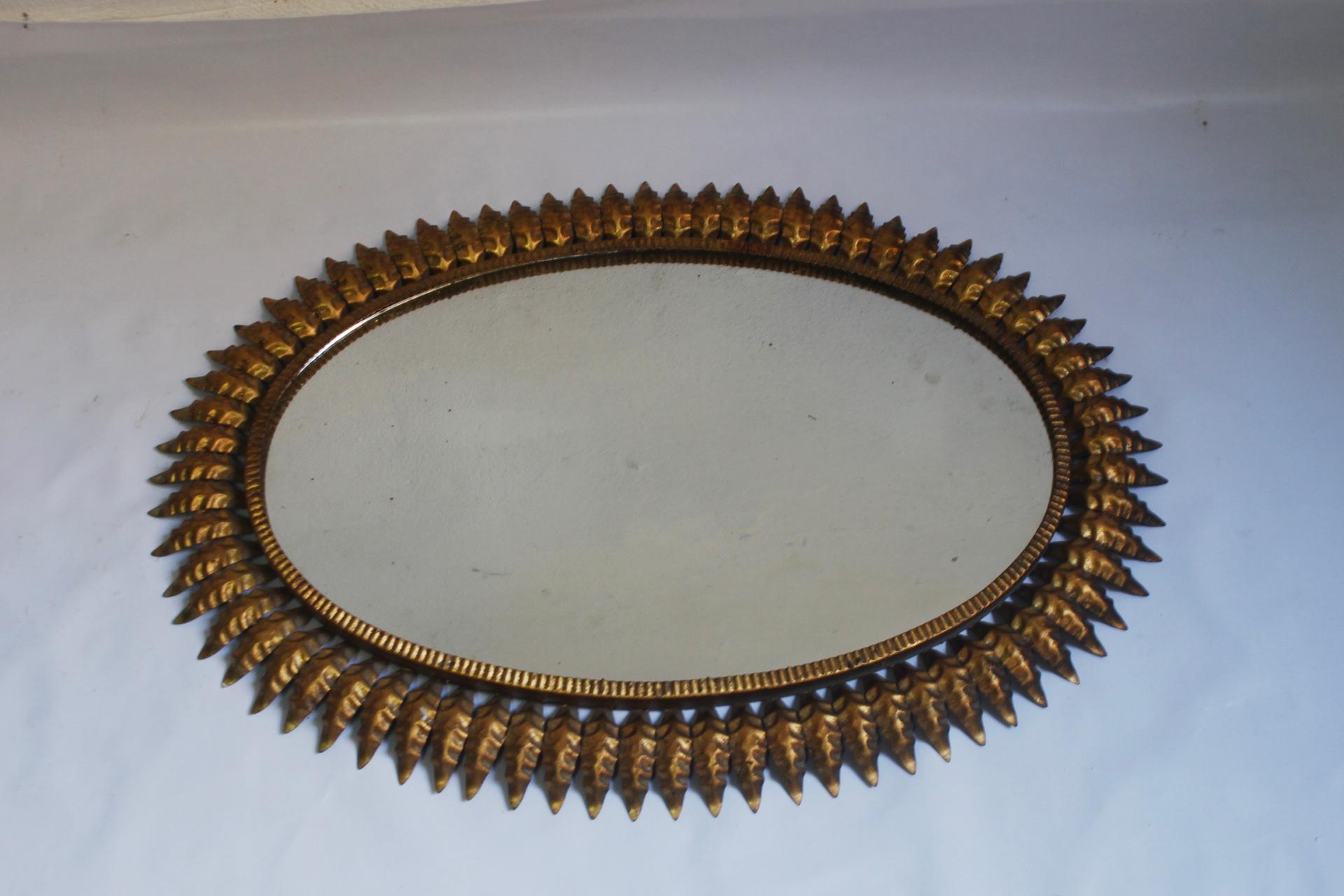 Mid-Century Modern Midcentury Large Oval Sunburst Floral Brass Wall Mirror, 1950s For Sale