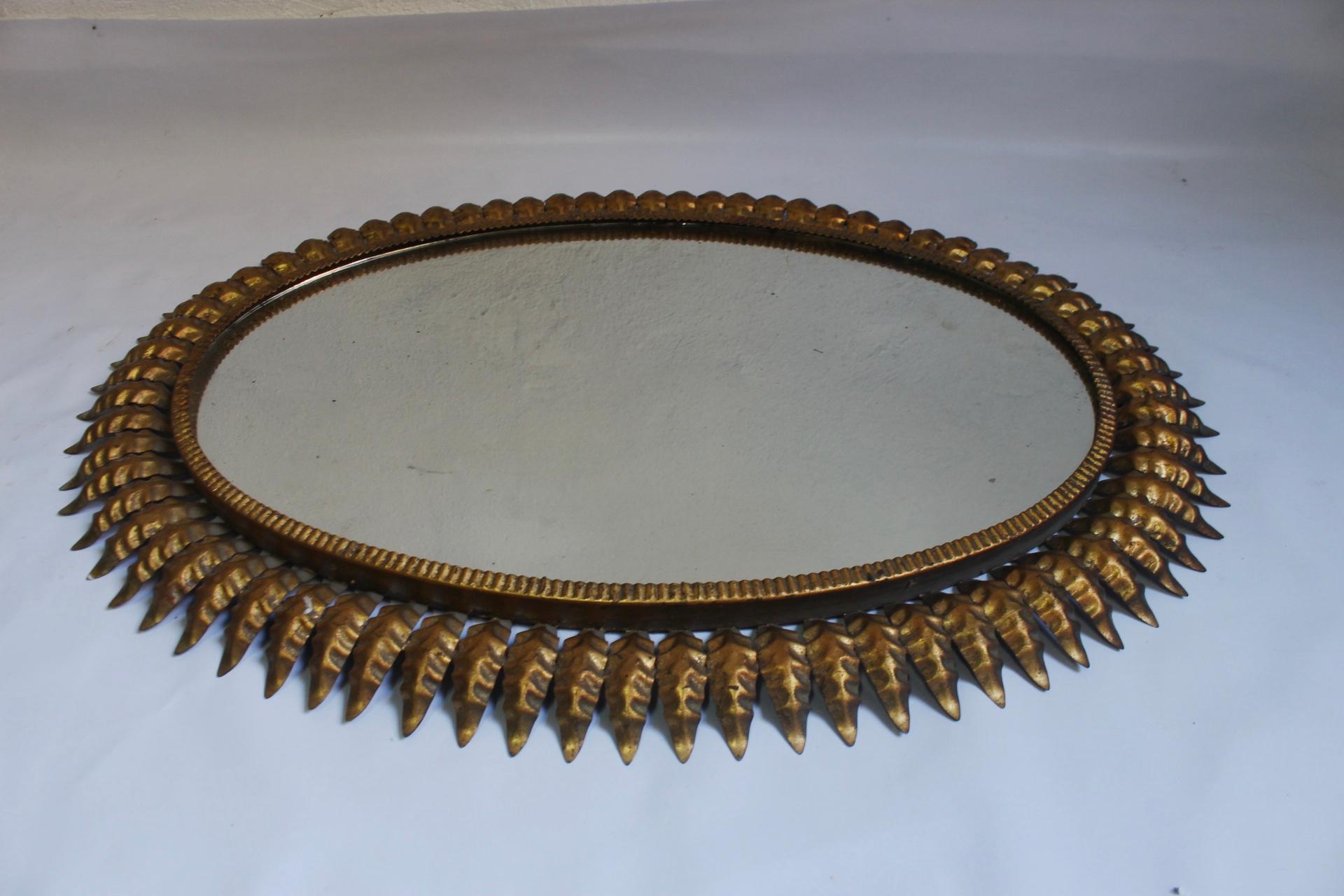 Mid-20th Century Midcentury Large Oval Sunburst Floral Brass Wall Mirror, 1950s For Sale
