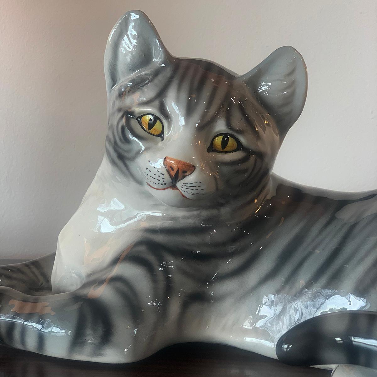 A large lifelike midcentury model of a striped cat, by Ronzan, Italy. There is no damage or repairs. In original condition, this is a very lifelike representation of a cat from Ronzan a master modeller of animals, Italy, circa 1950
Dimensions are