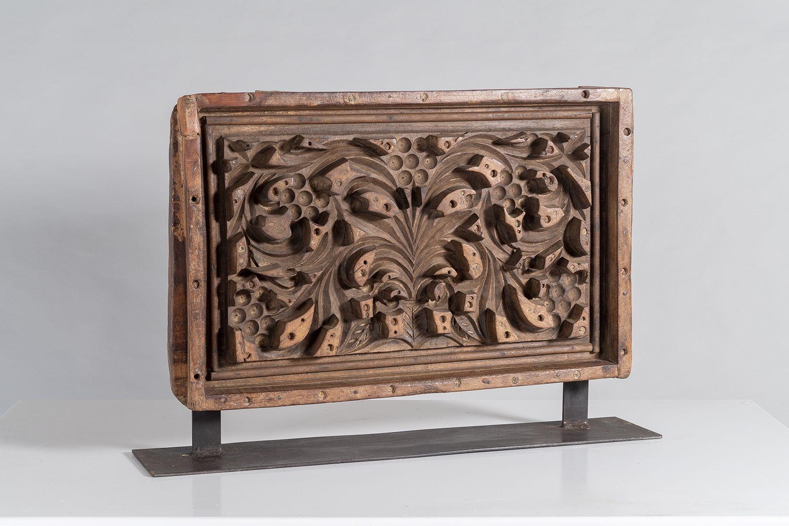 An impressive large scale sculptural wooden shelf art with good form and a beautiful rich warm wood colour tone.   These would have been originally carved for use as plaster moulds for producing decorative wall plaques.  Hand carved symmetrical