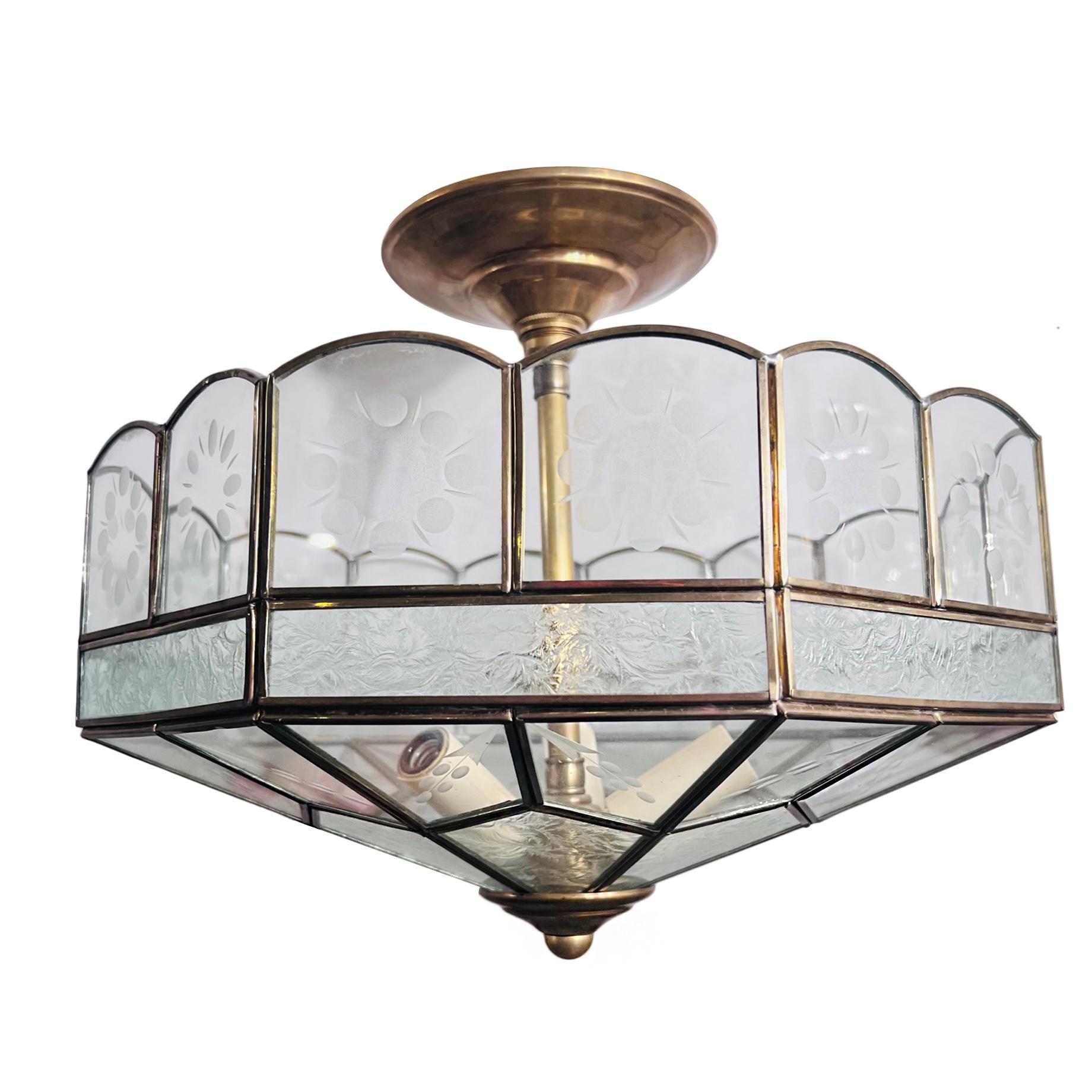 A circa 1960’s French leaded glass light fixture with 3 candelabra interior lights.

Measurements:
Present drop: 12?
Diameter: 13.5?