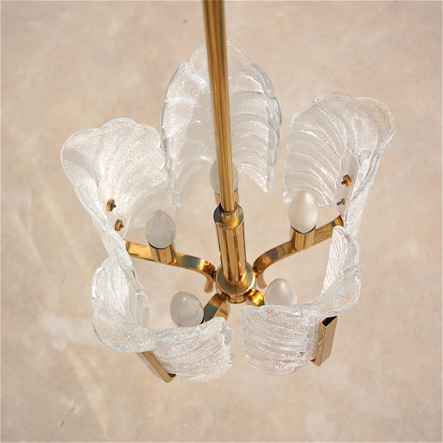 Five armed leaf pendant with glass shades and brass fittings designed by Carl Fagerlund and produced in the 1960s by German manufacturer JBS (original label). Five large, individual moulded glass shades in a leaf design on brass fittings. The leaves