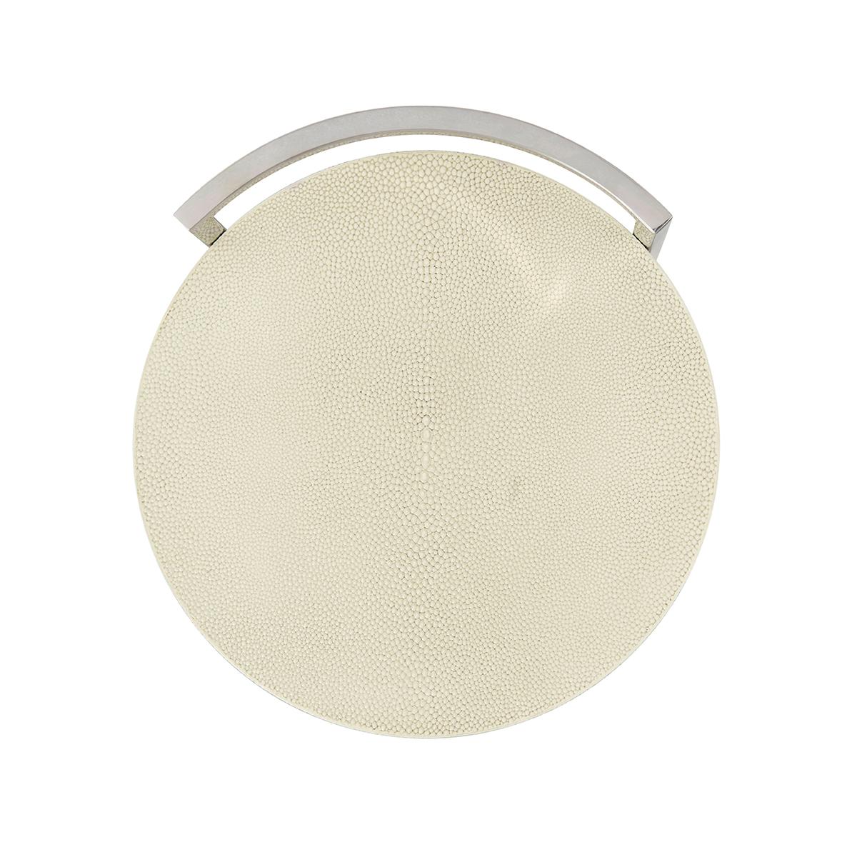 With a circular suspended faux shagreen wrapped top in a light cream overcast finish supported by a slender nickel finish base.

Dimensions: 12