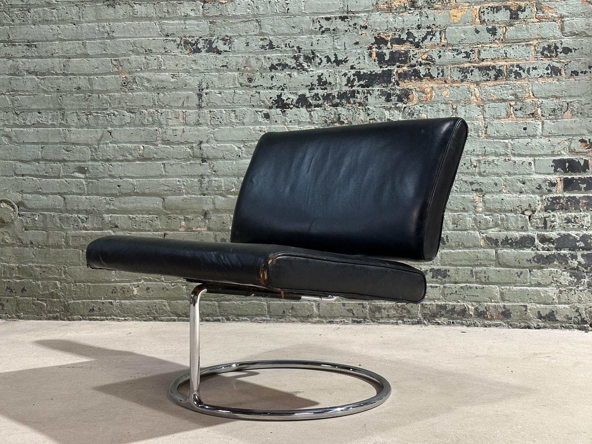Mid Century Leather and Stainless Steel Cantilever Lounge Chair, 1960.  Original condition, wear consistent with age and use.