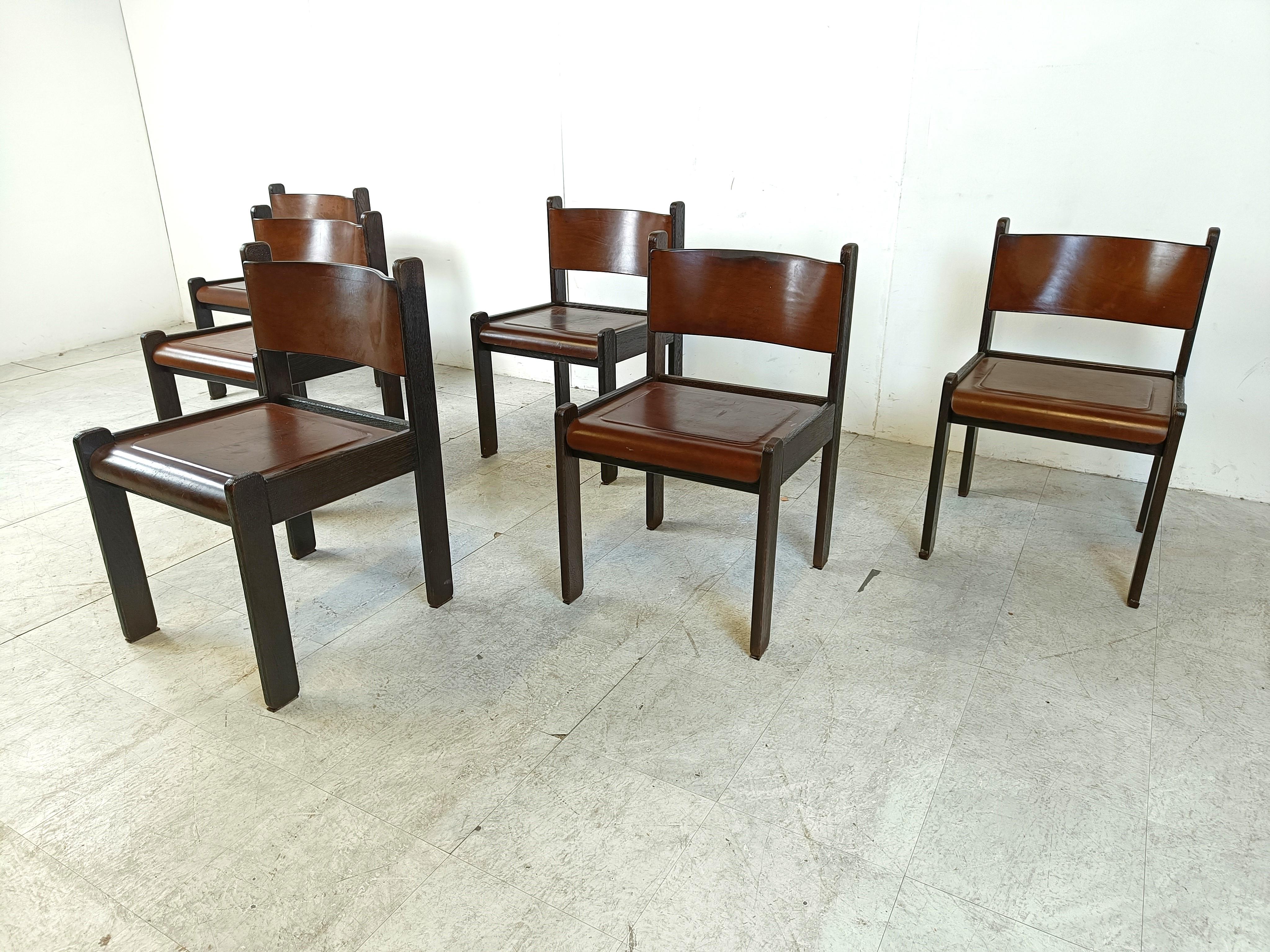 Leather Mid century leather and wood dining chairs, 1960s 