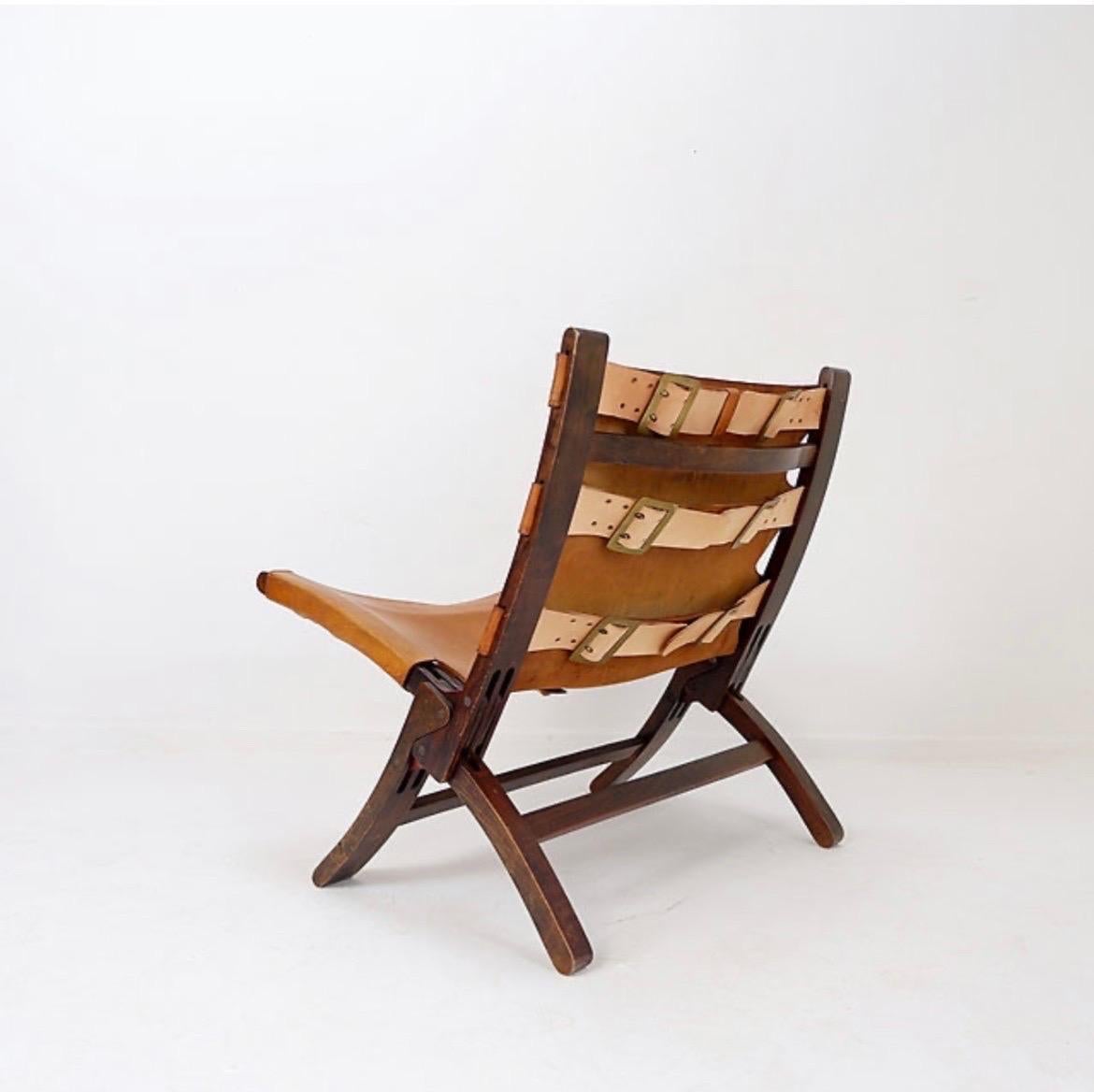Brutalist Mid century leather and wood folding armchair, 1950s For Sale