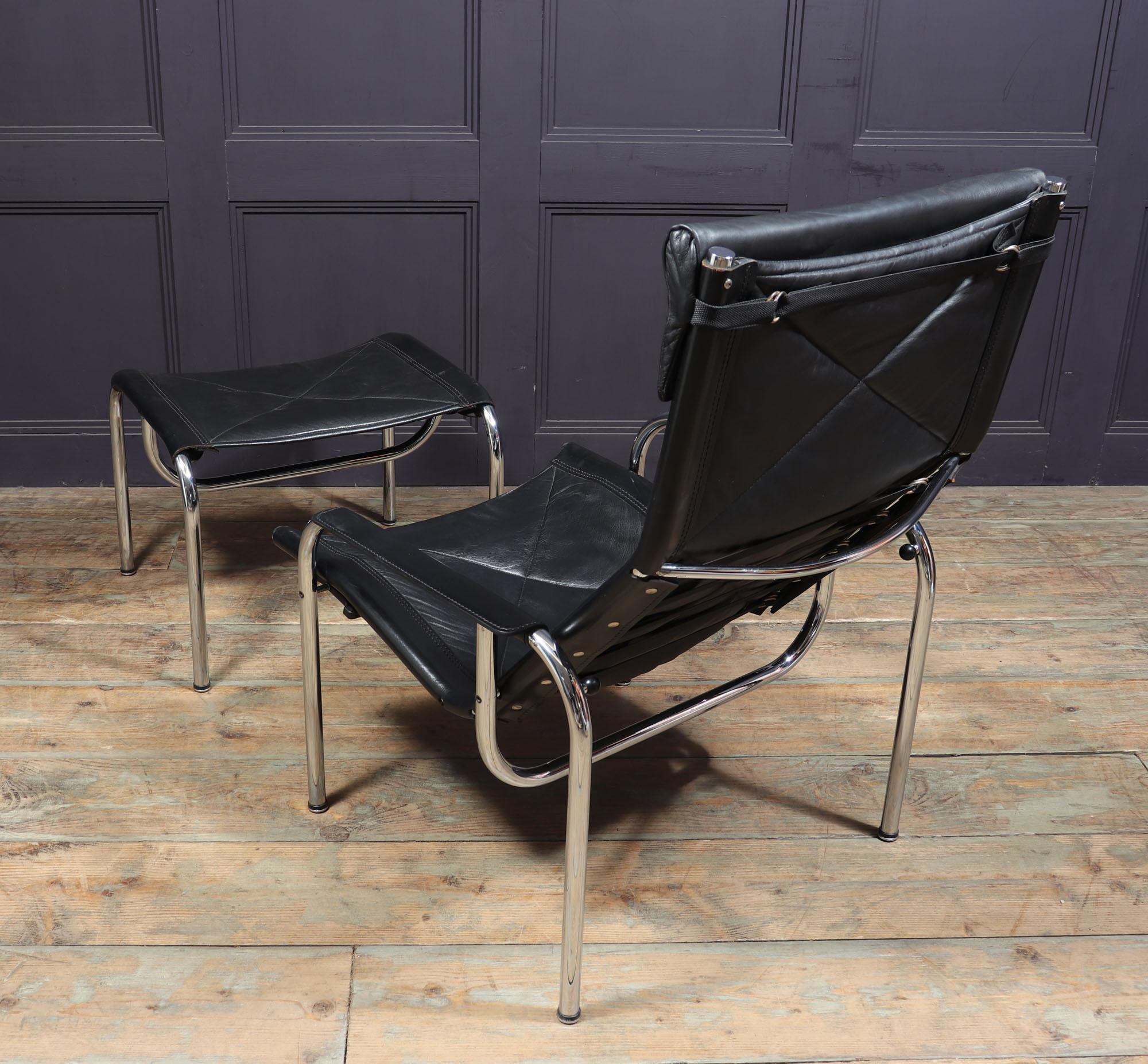 Mid Century Leather Armchair and stool by Hans Eichenberger For Sale 1