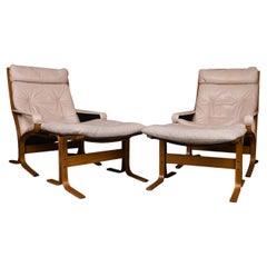 Mid-Century Leather Armchairs Lounge Chairs Ottomans by Ingmar Relling