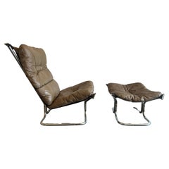 Mid century Leather Chrome Lounge Chair and Ottoman by Sigurd Ressell
