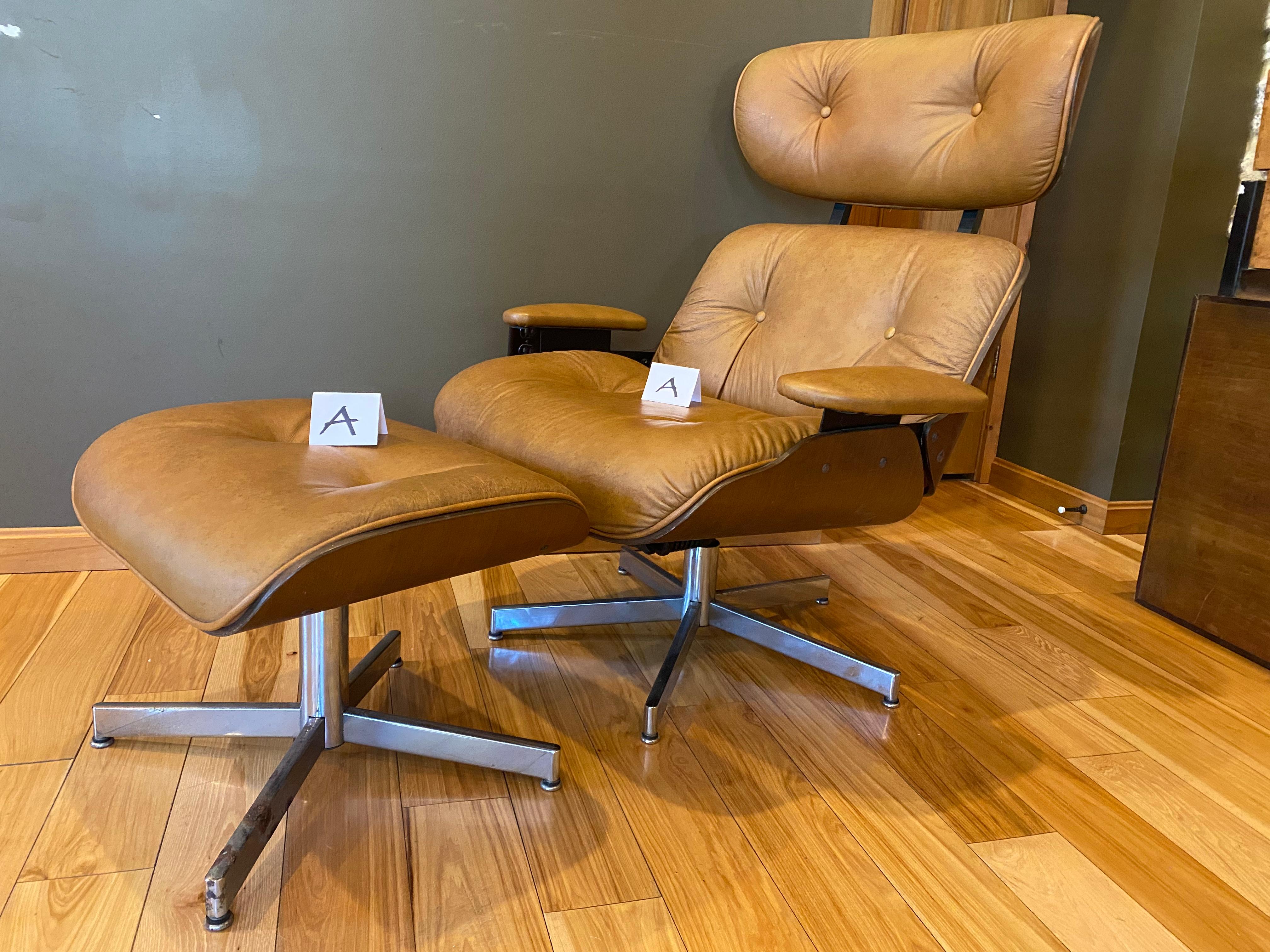 Mid-century leather Eames style lounge chair and ottoman set by Selig.

Light camel-colored leather and molded wood lounge chair and ottoman set by Selig Manufacturing Co. Modeled after the classic Eames lounge chair (Herman Miller), the Selig chair
