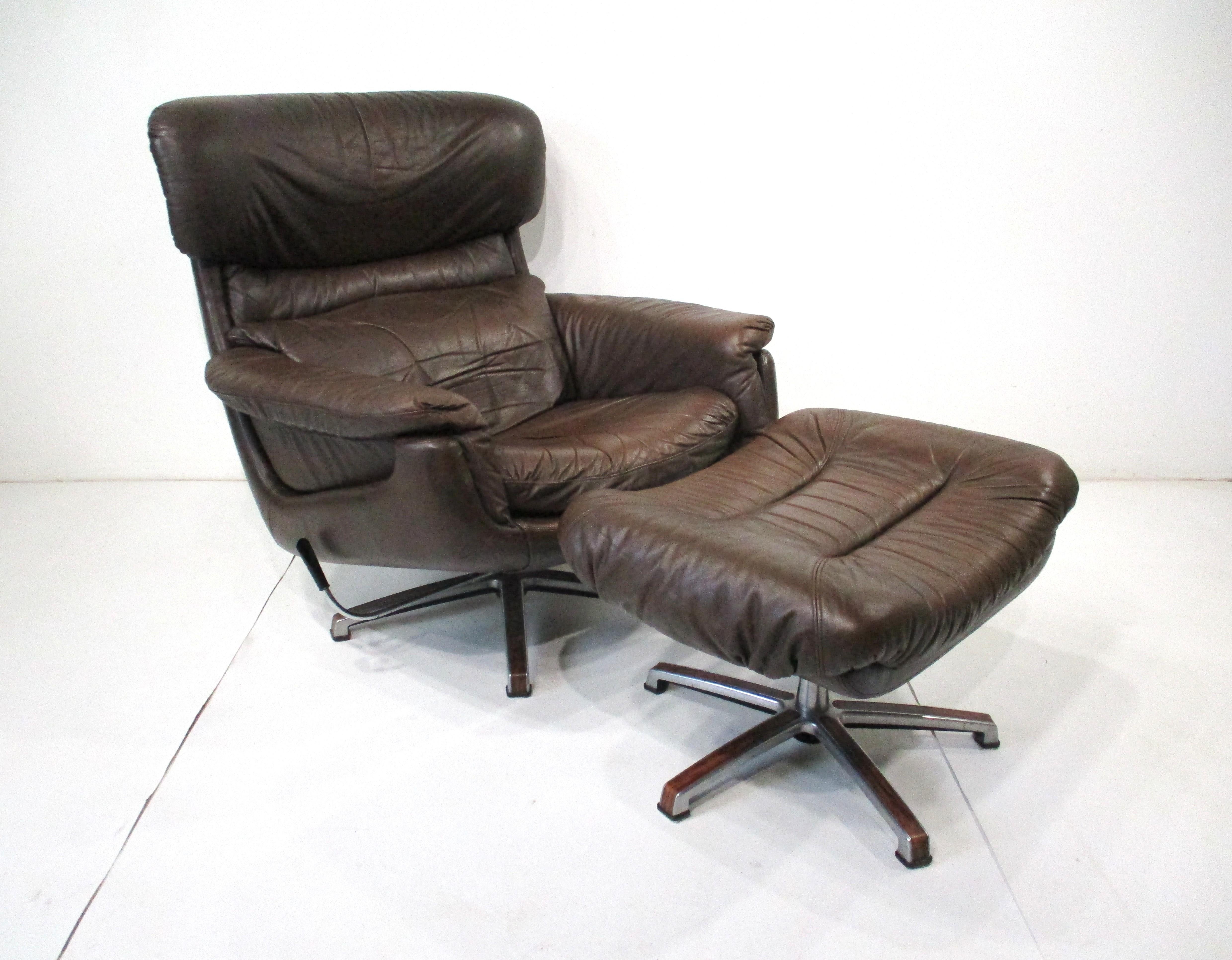 If your looking for the most comfortable Mid Century leather lounge chair and ottoman you will ever sit in your search is over . Covered in a rich brown comfort seat leather which has the gathering intended to give you that plush luxurious and yet