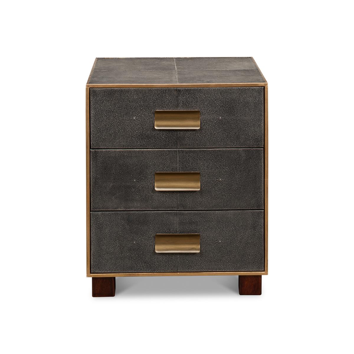 Wrapped in a faux shagreen leather in an antiqued gray leather. With gold highlights and trim, three drawers raised on short block feet.

Dimensions: 20