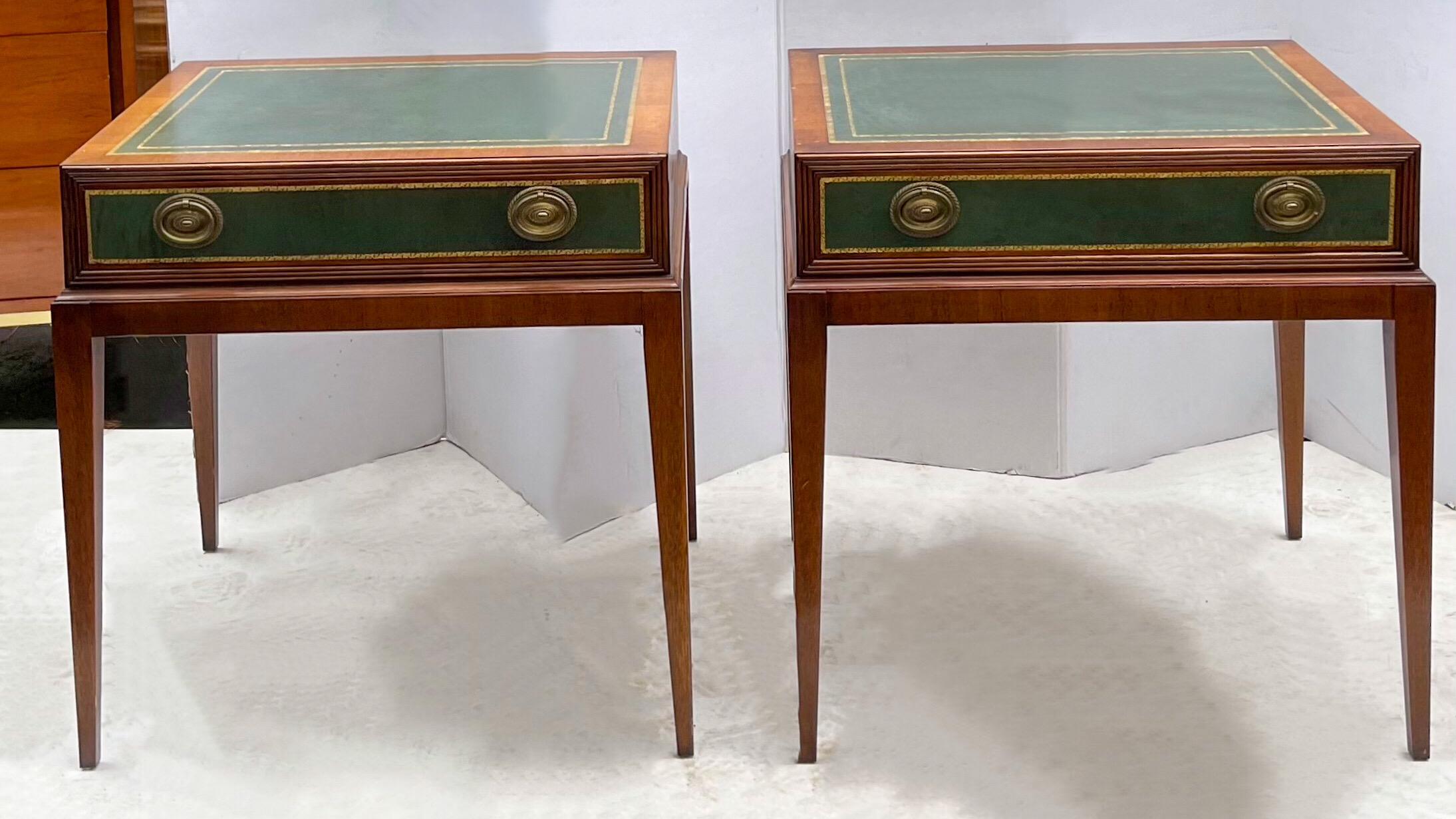 This is a pair of good looking green tooled leather side tables that are in the manner of Parzinger for Charak. They have green tooled leather surfaces and original hardware, but the clean lines and tapered legs really elevate the look. I did not