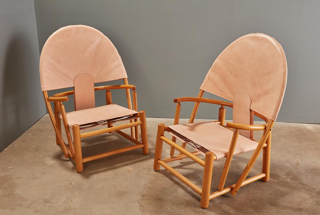 Mid Century Leather Sling G23 Hoop chairs by Piero Palange, A Pair. 
Large on personality as well as footprint, these G23 chairs have been restored using a natural tanned leather that will darken with use. Originally, when this pair of chairs was
