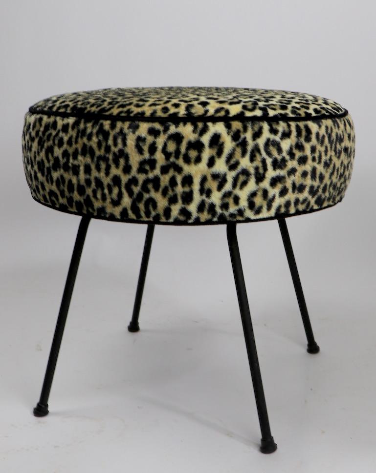 Pure Glam style, newly reupholstered in Leopard pattern fabric on solid wrought iron legs. Pad seat 5 inch thick.