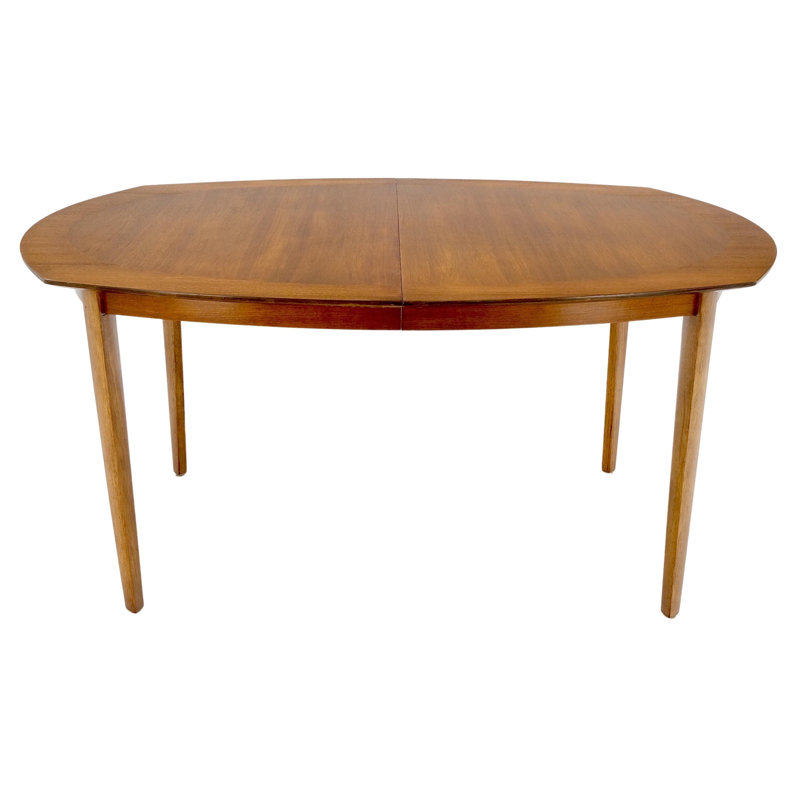 Mid-Century Modern light walnut boat oval shape banded dining table 2x18