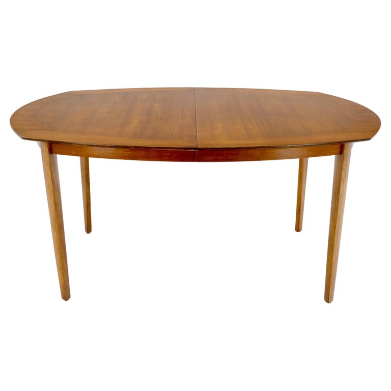 Mid-Century Modern light walnut boat oval shape banded dining table 2x18