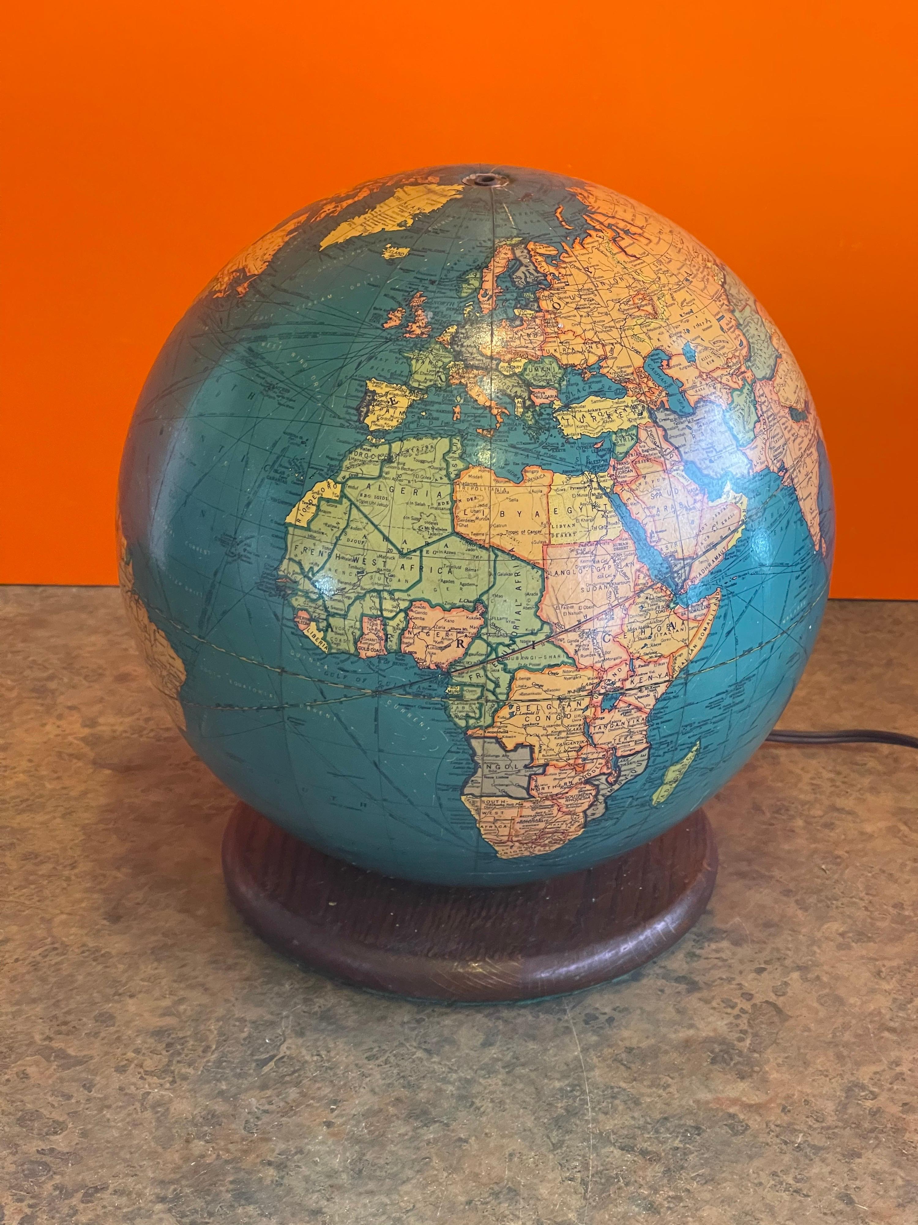 lighted globe on stand