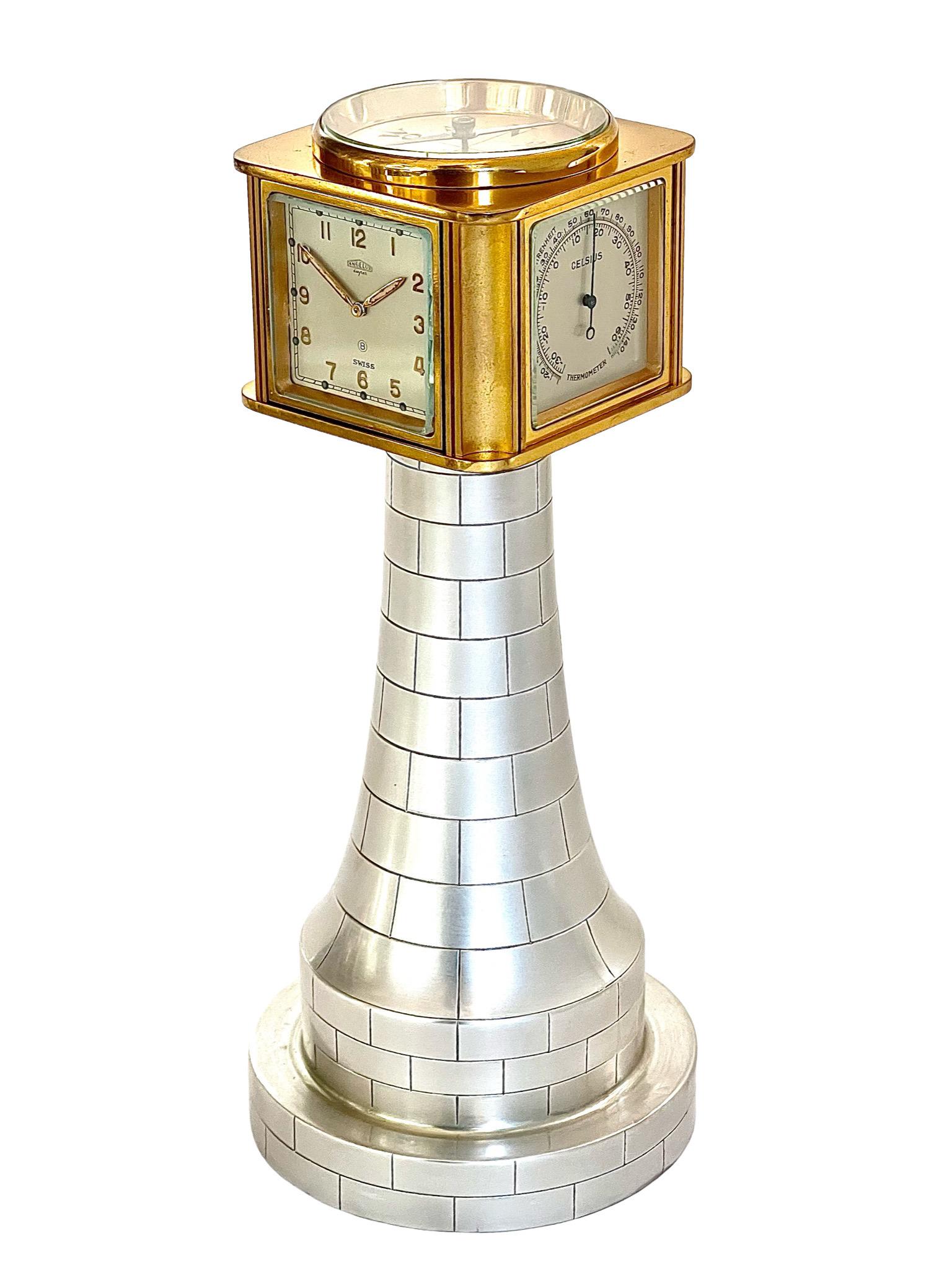 A midcentury eight day timepiece weather compendium by the renowned Swiss watch company, Angelus. The compendium takes on the charming form of a lighthouse, it's design is not only aesthetically pleasing but it also serves a practical purpose by