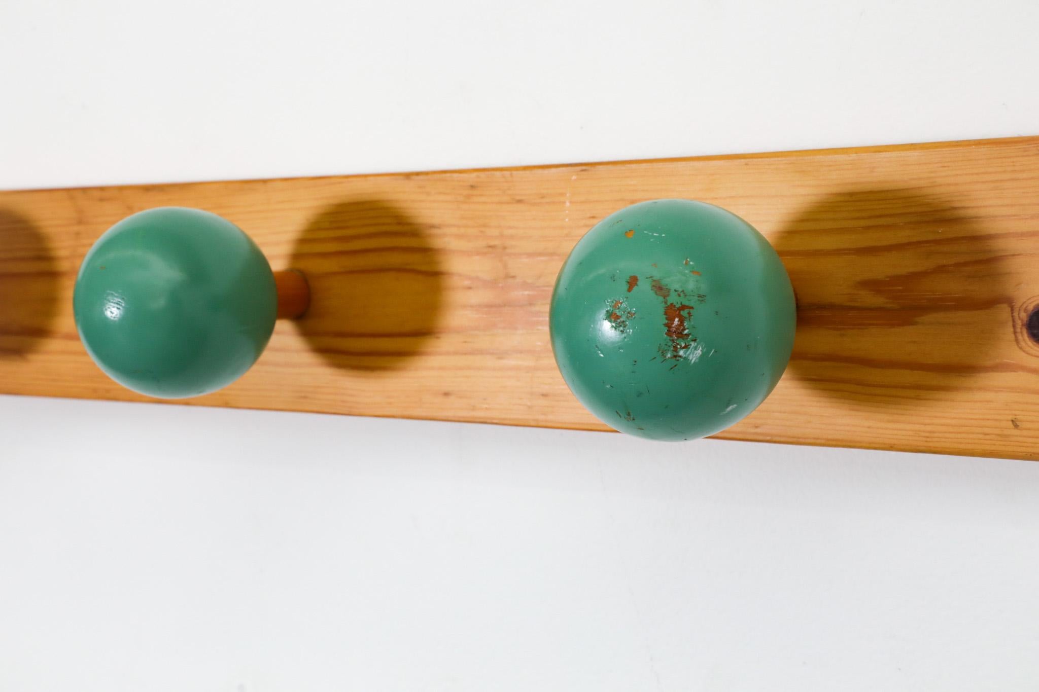 20th Century Mid-Century Linear Wall Mount Pine Coat Rack with Green Lacquered Ball Hooks