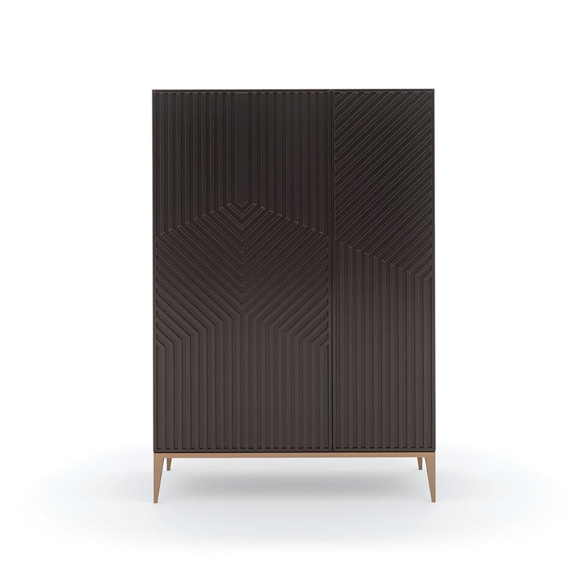 Drawing the eye with its distinctive design, this tall chest or dressing cabinet introduces a bold, modern graphic to any interior. Thin wood strips applied to the door panels create texture and a linear labyrinth for added dimension.

Generous