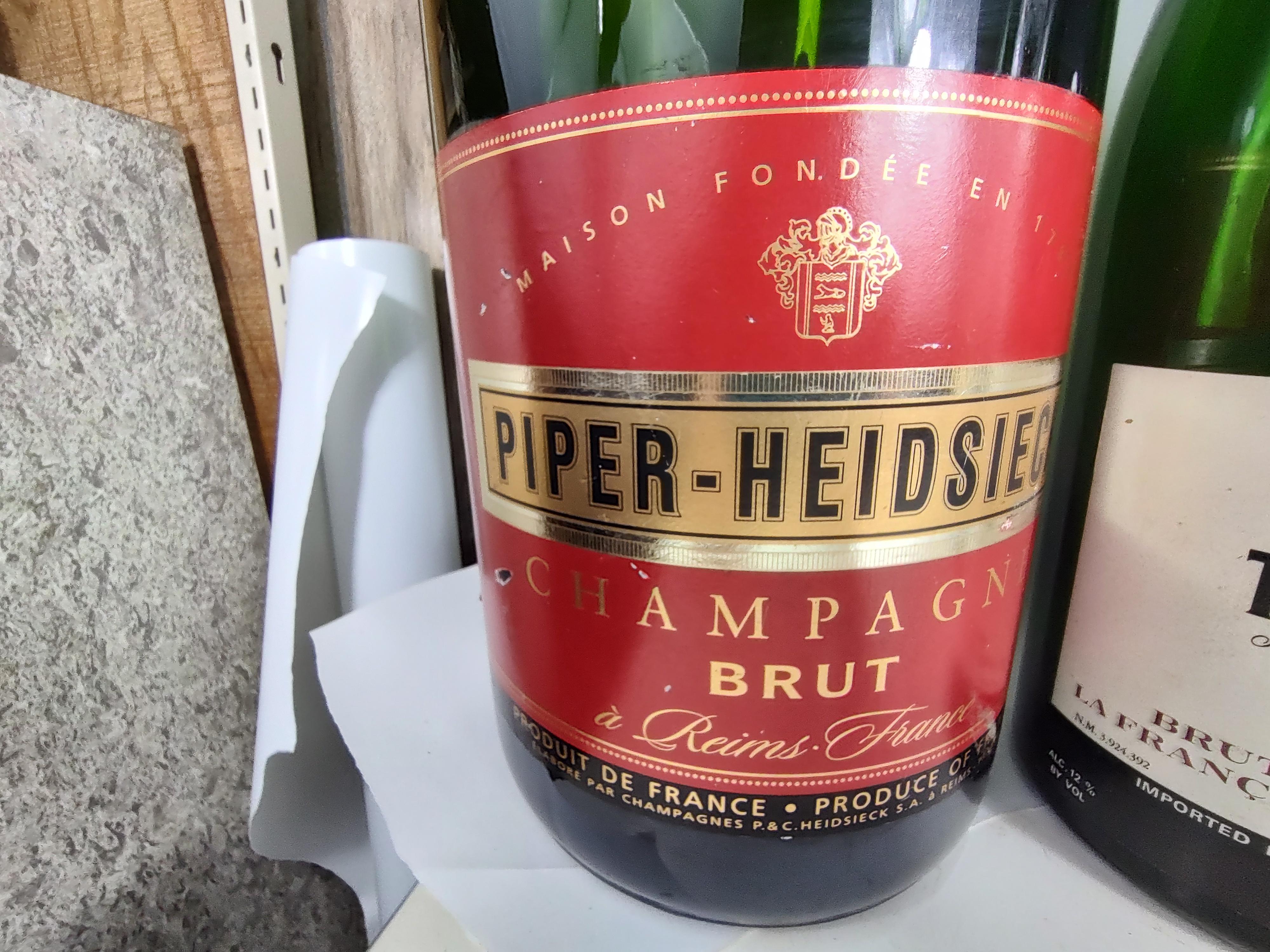 Spectacular in size, 3 bottles are 27 x 7.5, smaller bottle is 20 x 4.5. Taittinger, Perrier Jouet, Moet & Chandon and Piper Heidsieck. All in good condition with age related wear. Can be parcel posted.