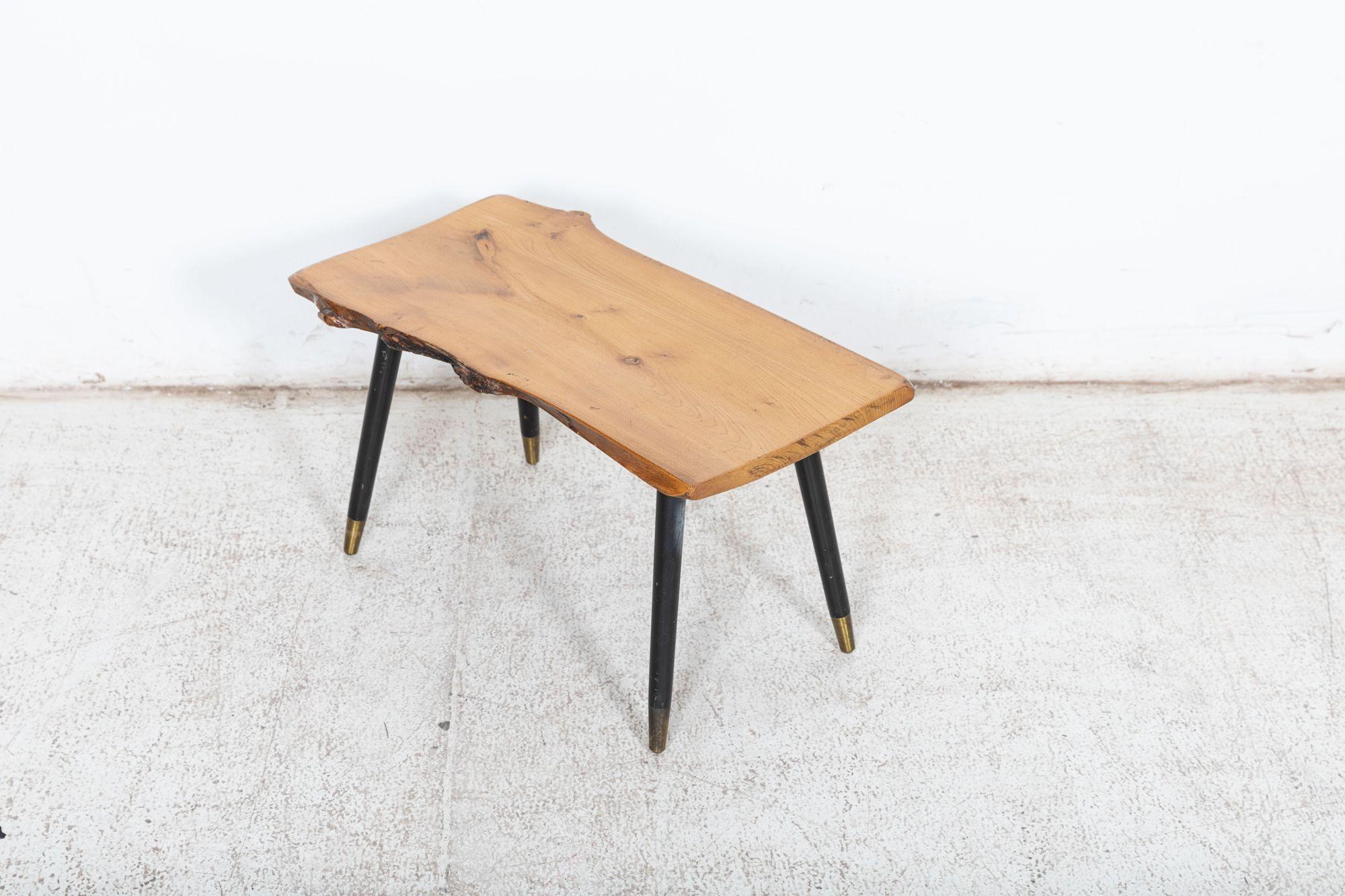 Circa 1950
Mid century live edge teak coffee table
Measures: W 60 x D 30 x H 34 cm.
    
