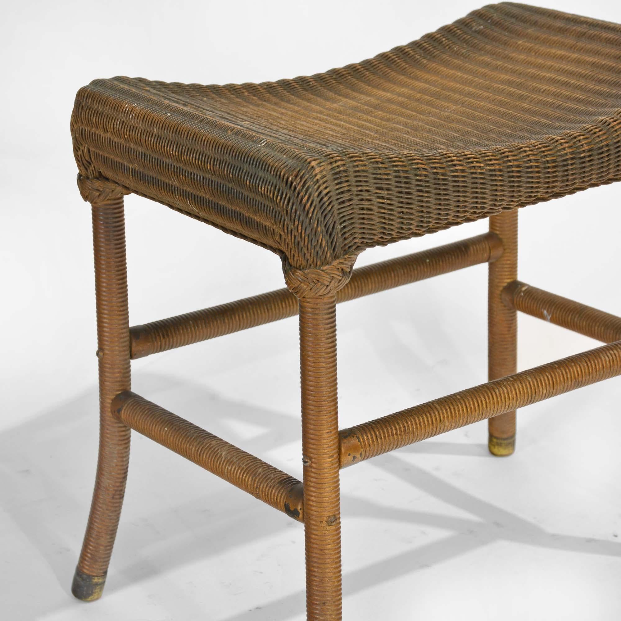 Lloyd Loom stool
Iconic 20th century design, the saddle seat stool in original gold paint, the Lloyd loom or weave is made from craft paper woven onto wire.   In lovely condition.
British, mid 20th century

48cm H, 50cm W, 32cm D.