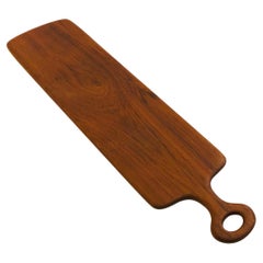 Tagliere a paletta in teak lungo di metà secolo