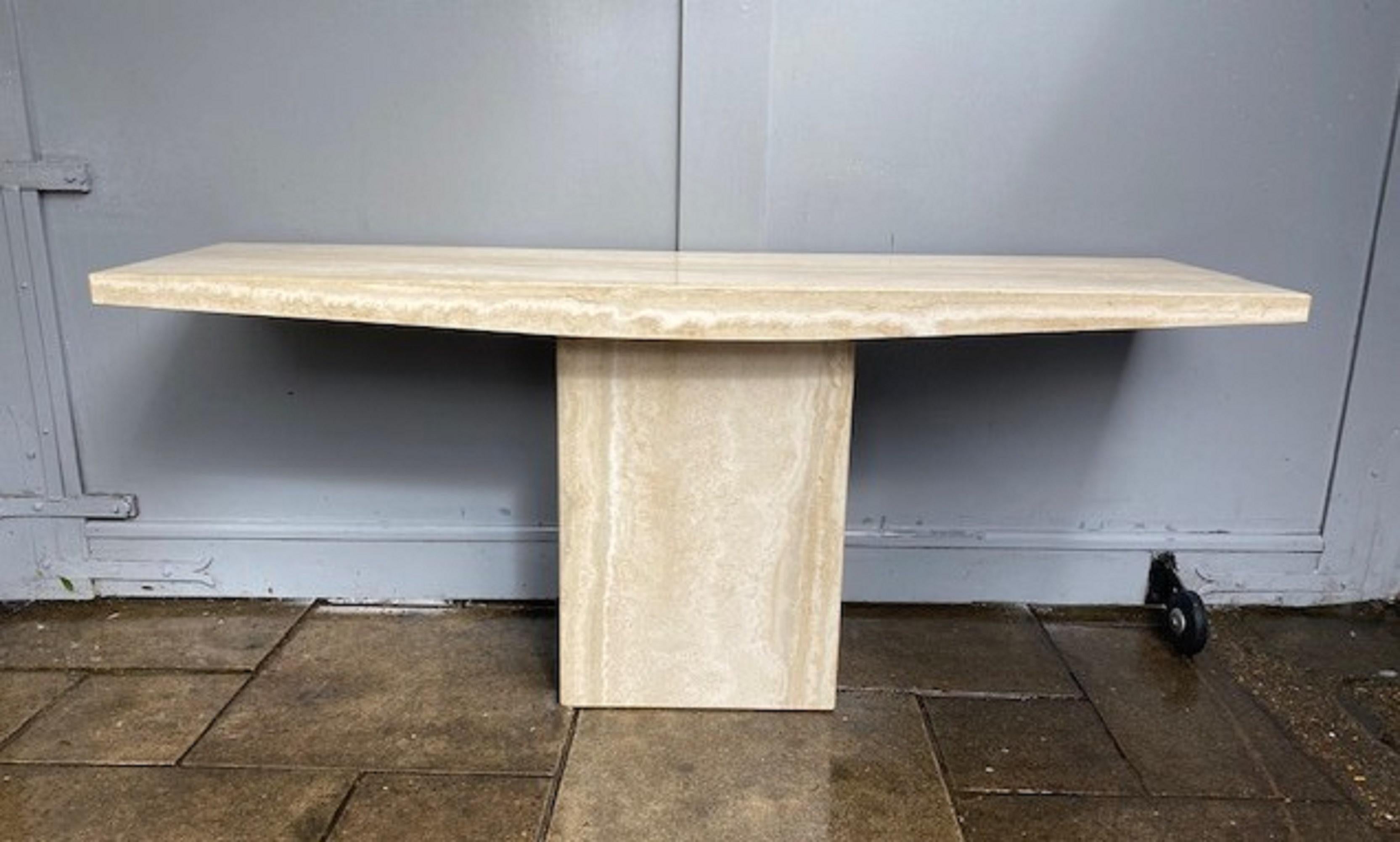 Mid-Century Long Travertine Console Table, Italian, 1970s

Magnificent Mid-century Travertine Console table with an elegant curved skirt around the top, front and back. It does not need to be leant against a wall, this makes it more functional than