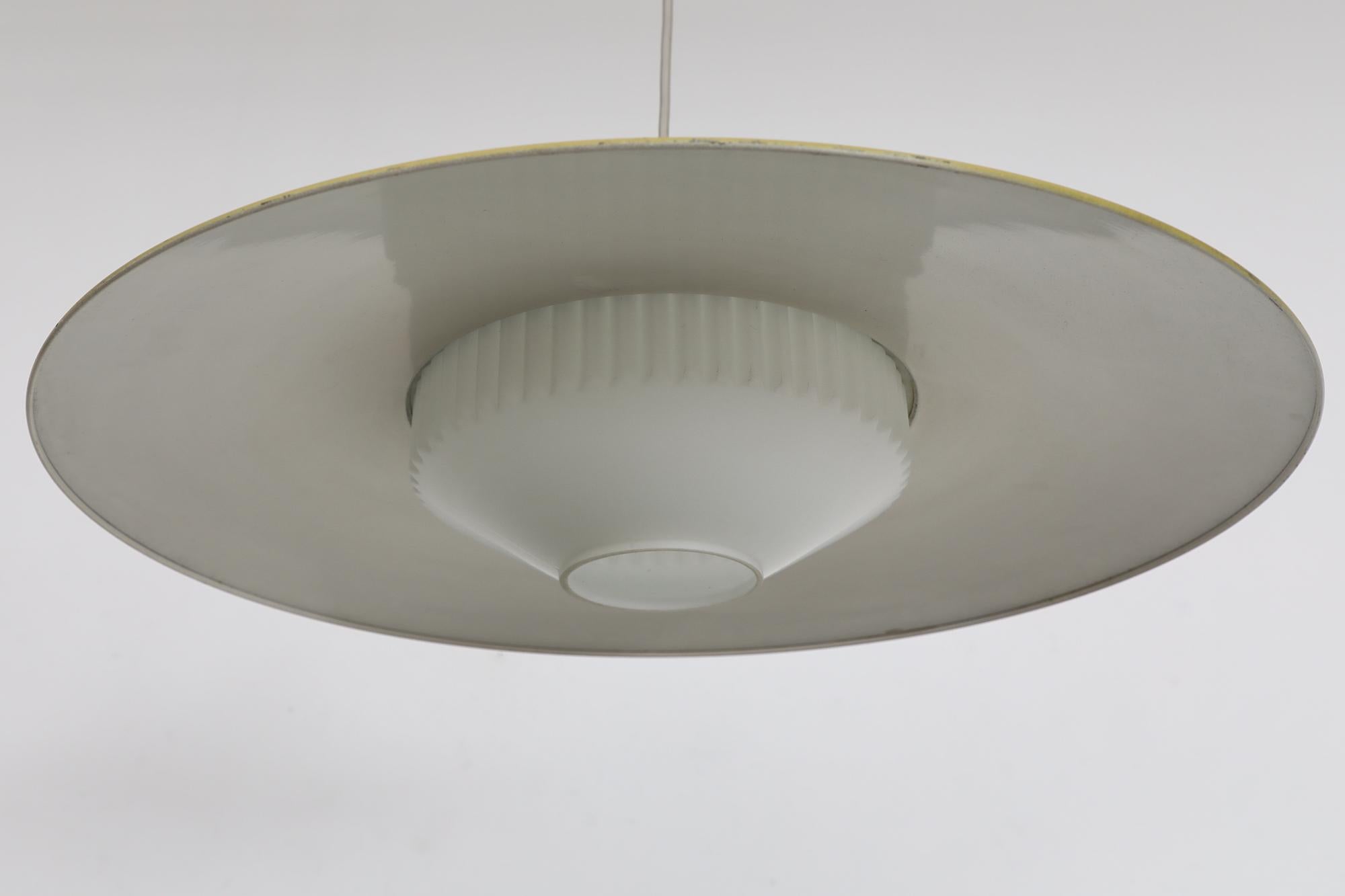Mid-Century Louis Kalff (attr) Yellow and White UFO Philips Ceiling Pendant In Good Condition For Sale In Los Angeles, CA