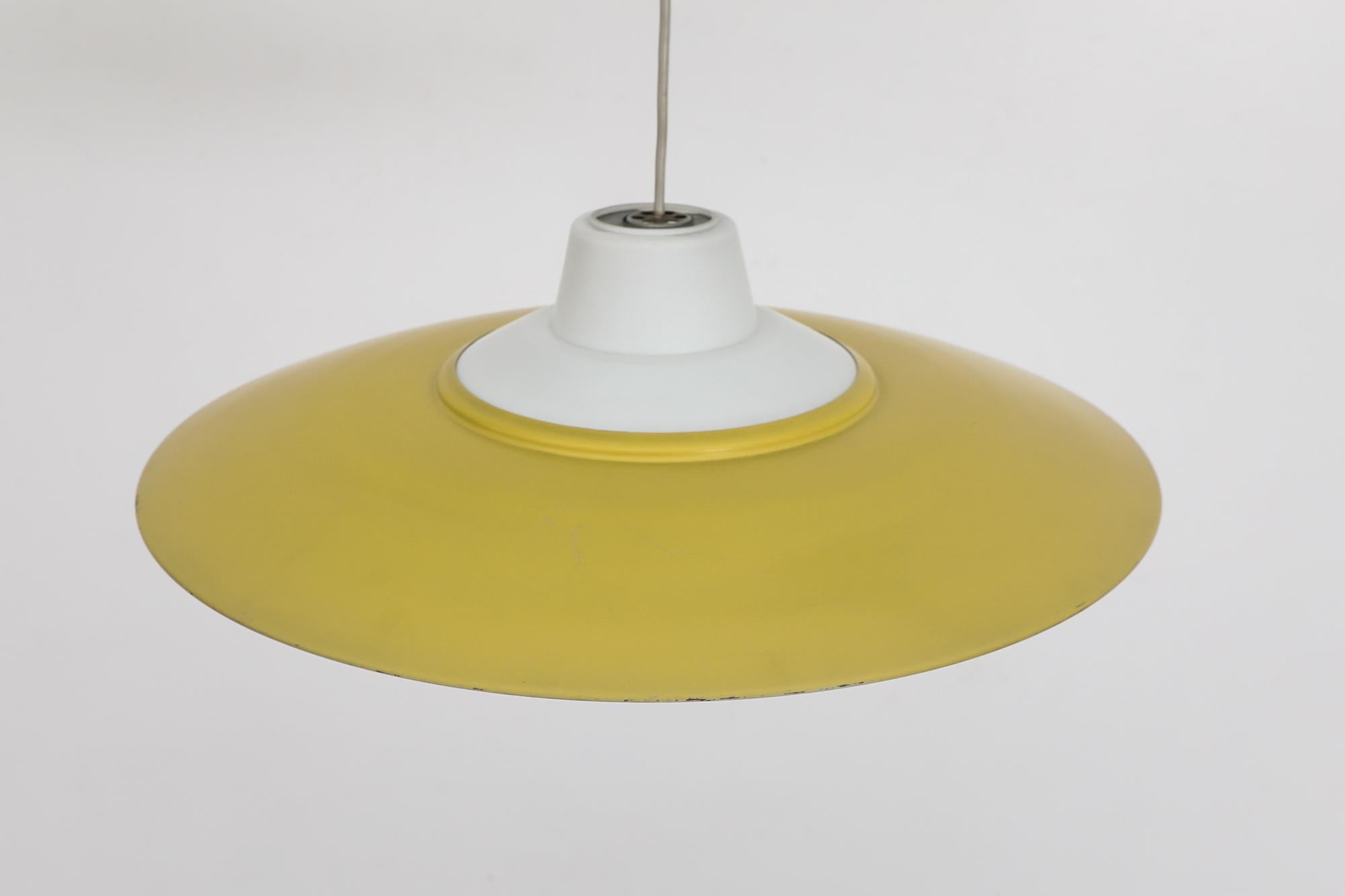 Metal Mid-Century Louis Kalff (attr) Yellow and White UFO Philips Ceiling Pendant For Sale