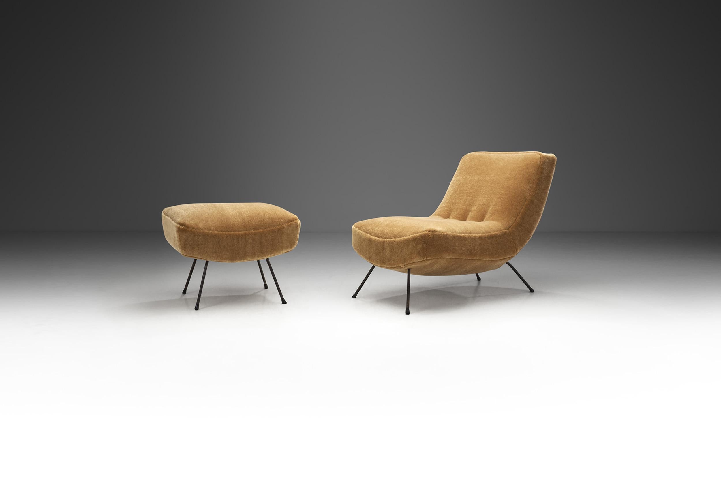 This imposing set is a visually stunning representation of European modern design. The well-thought-out minimalism of this lounge chair and footstool expresses a stylishness that is uninfluenced by the passing of time.

The set owes much of its