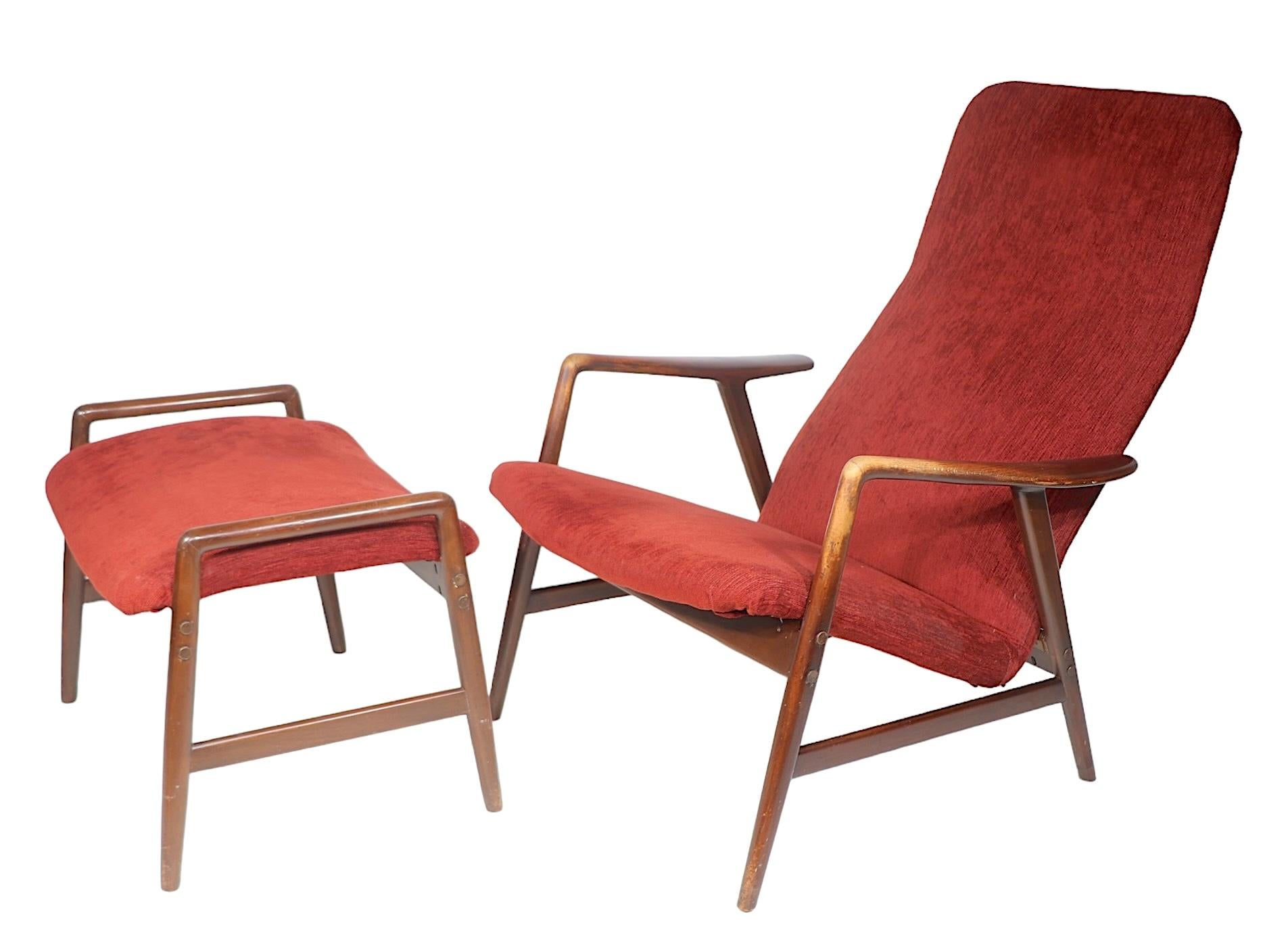Chic architectural Mid Century  lounge chair and ottoman designed by Alf Svensson for Fritz Hansen, made in Denmark circa 1960's. This example is in very good, clean, ready to use condition, it is currently in  a later, but not new, dark finish