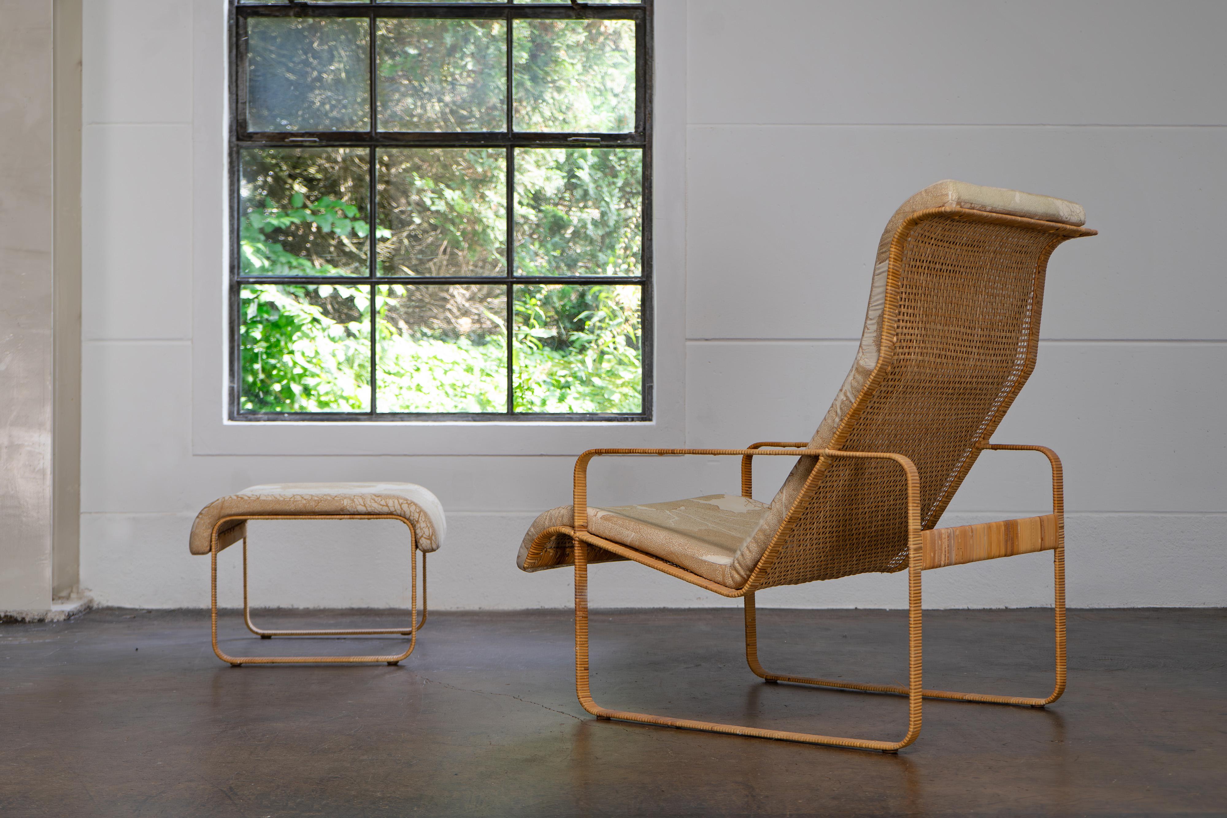 Extremely rare lounge chair and ottoman by Kill International with beautiful organic design fabric. The frame is made of steel and covered with rattan.