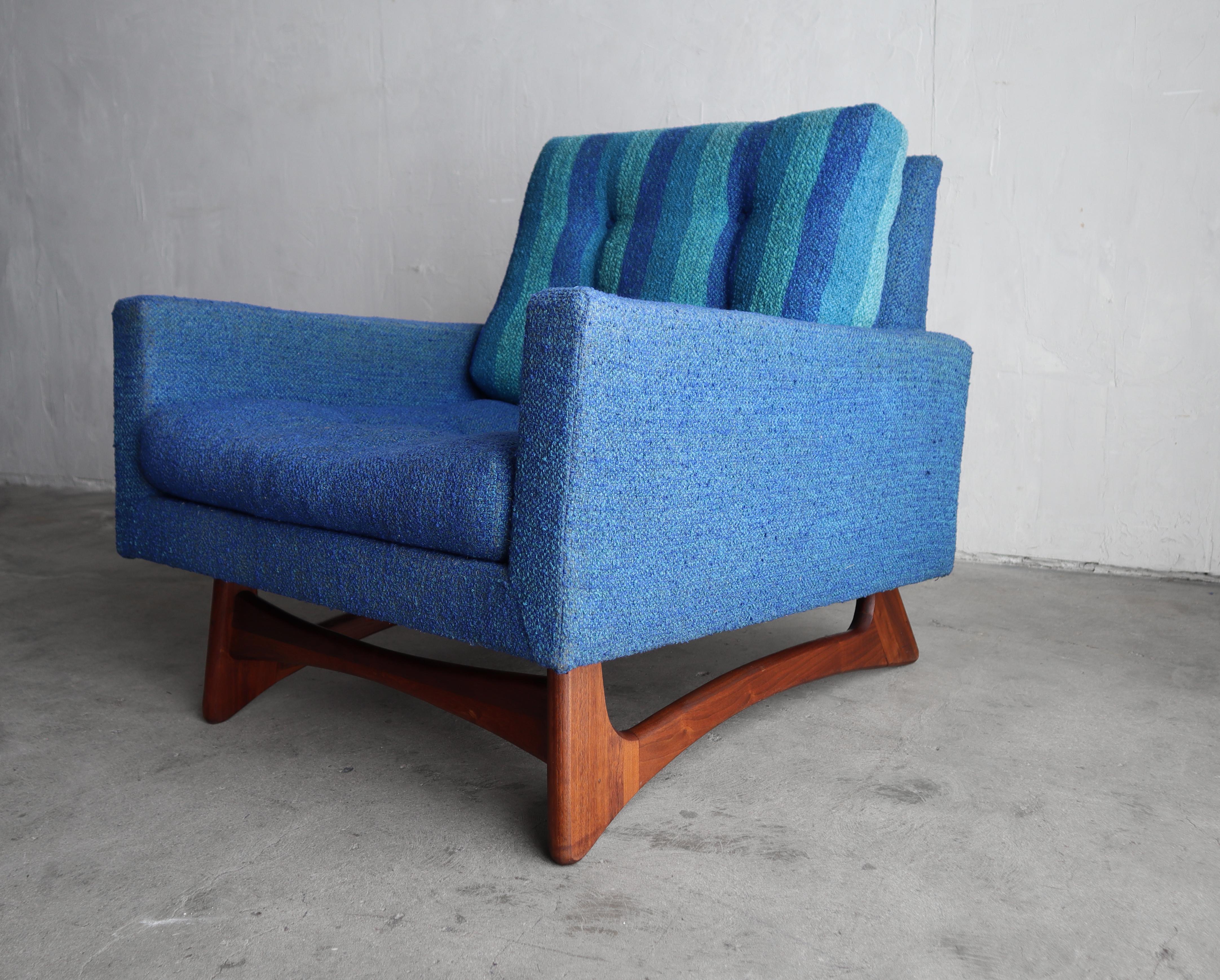 This is an all original Mid Century lounge chair by Adrian Pearsall for Craft Associates. Model 2406.  The super clean lines and beautiful sculpted walnut base, make this one of Pearsall's best designs. 

Matching Model 2408 sofa also available in a