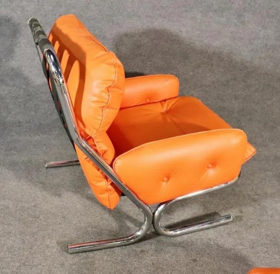 Funky bubble chair made by Directional. Tufted orange Naugahyde cushions on polished tubular frame.
Please confirm location NY or NJ