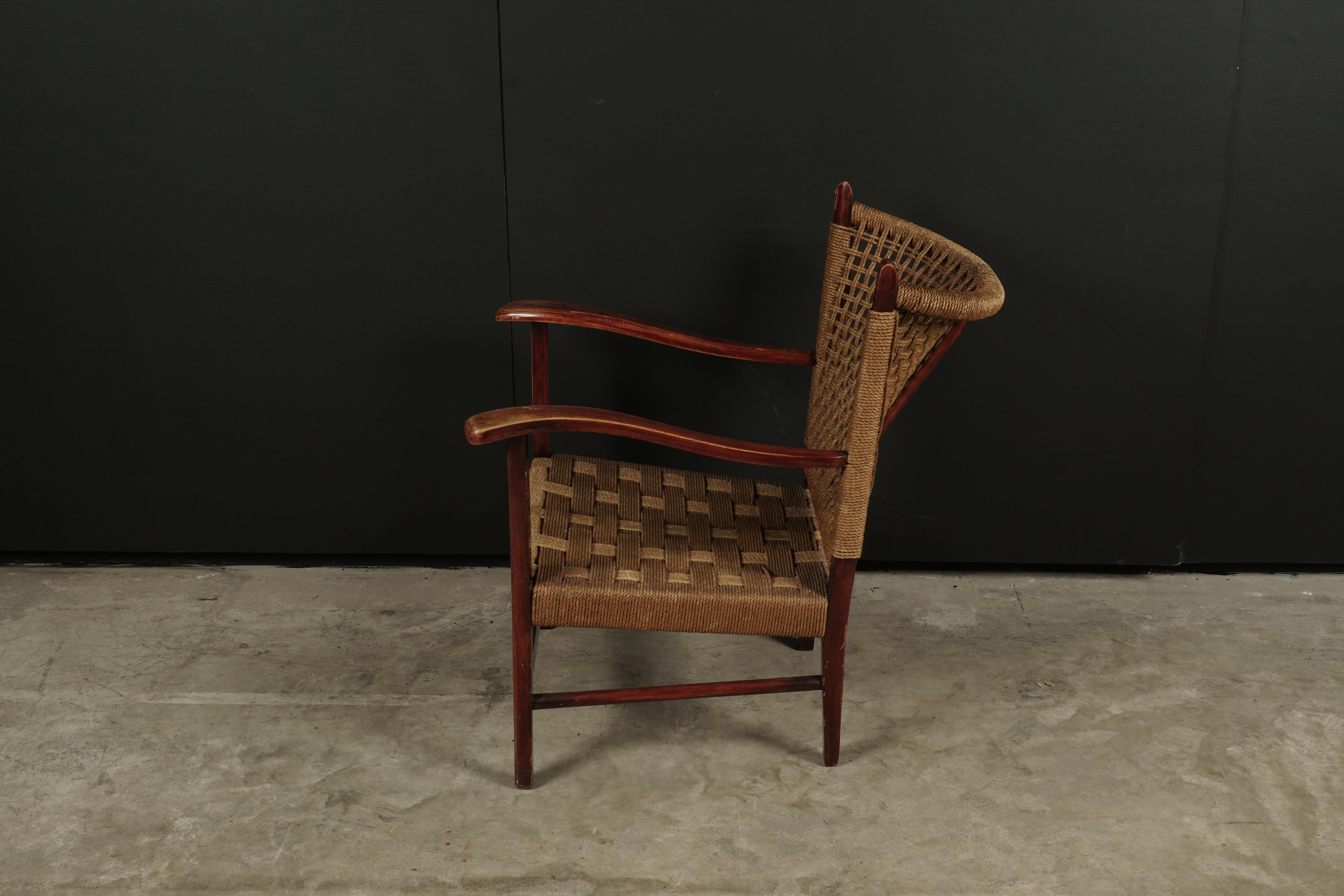 Midcentury lounge chair from Holland, 1950s. Original birch frame with stretched papercoard seat and back.
