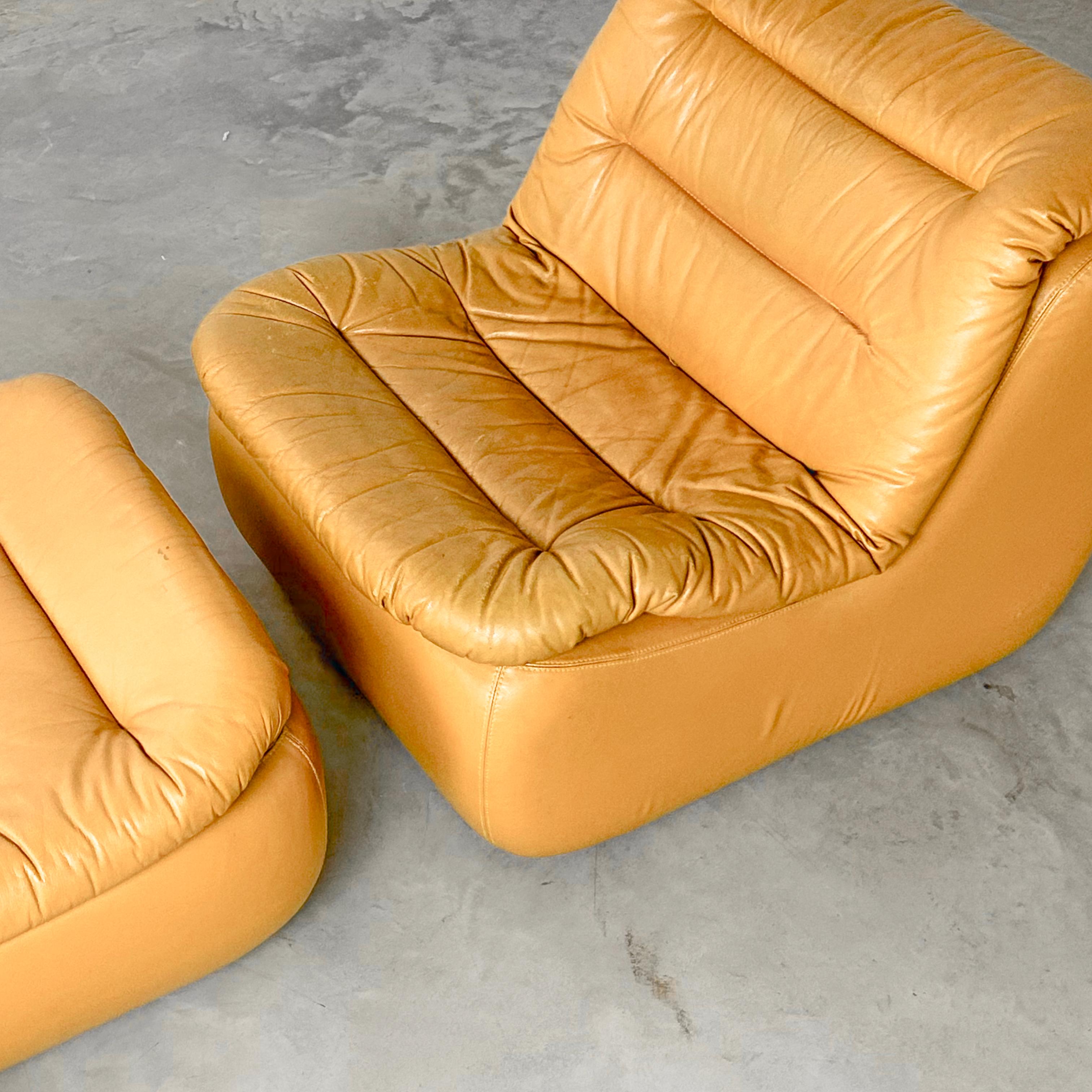 Late 20th Century 1970s Style Lounge Chair & Ottoman in Vintage Leather For Sale