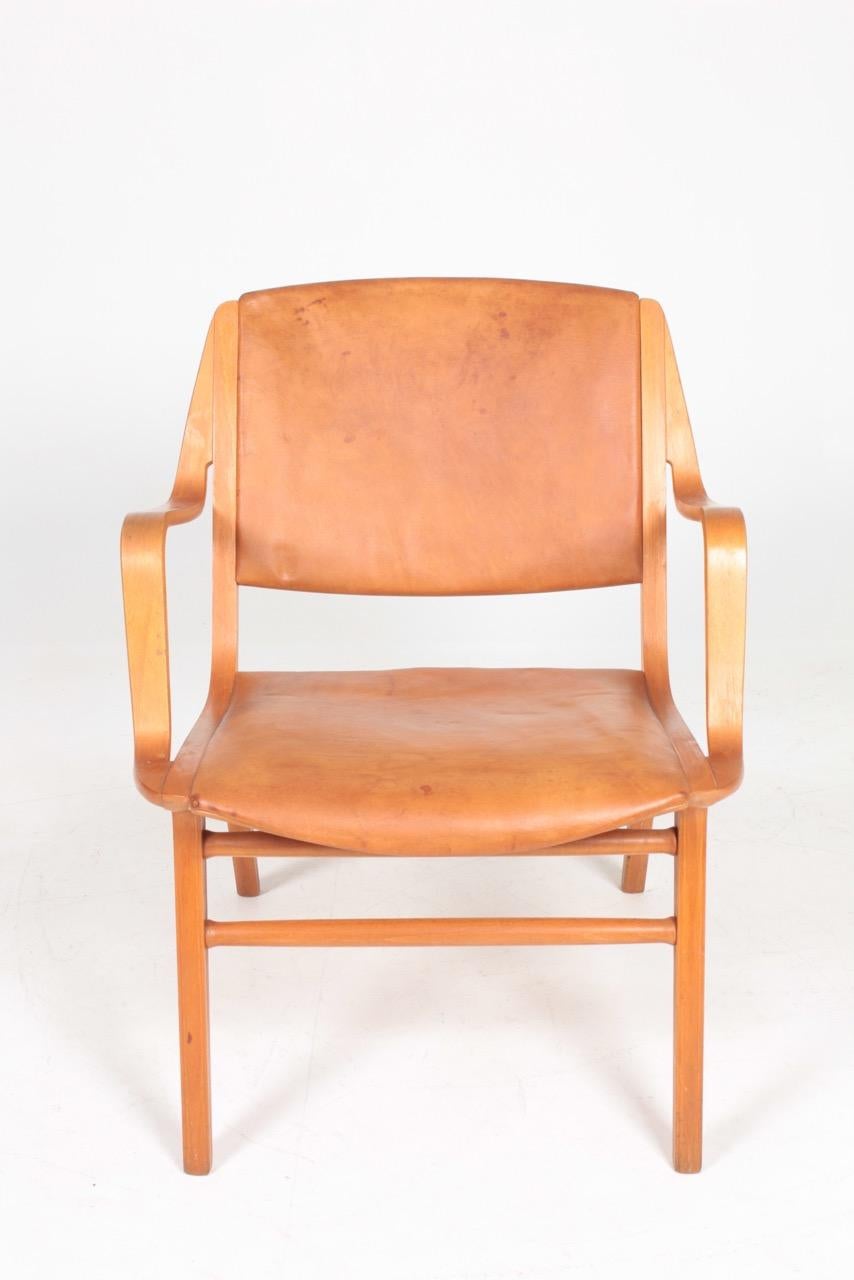 Scandinavian Modern Midcentury Lounge Chair in Patinated Leather by Hvidt & Mølgaard, Danish Design