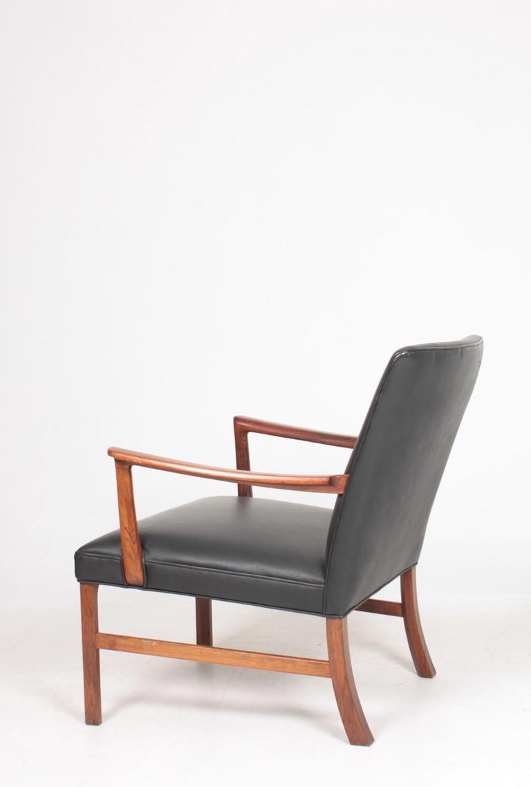 Mid-20th Century Midcentury Lounge Chair in Rosewood and Leather by Wanscher, Danish Design 1950s For Sale