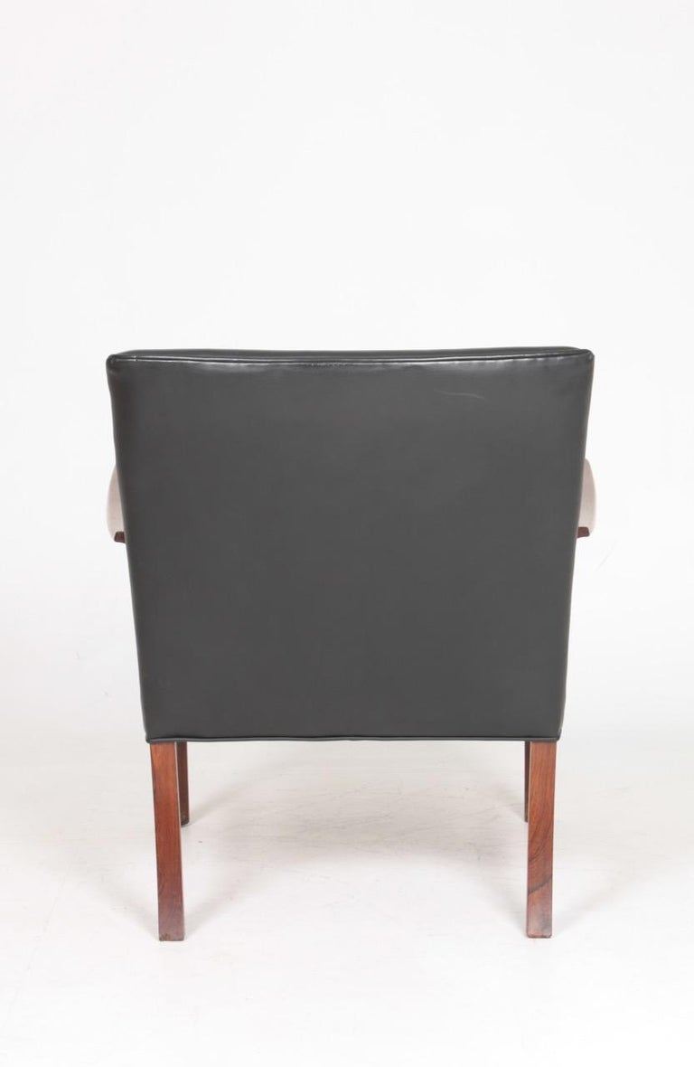 Midcentury Lounge Chair in Rosewood and Leather by Wanscher, Danish Design 1950s For Sale 3