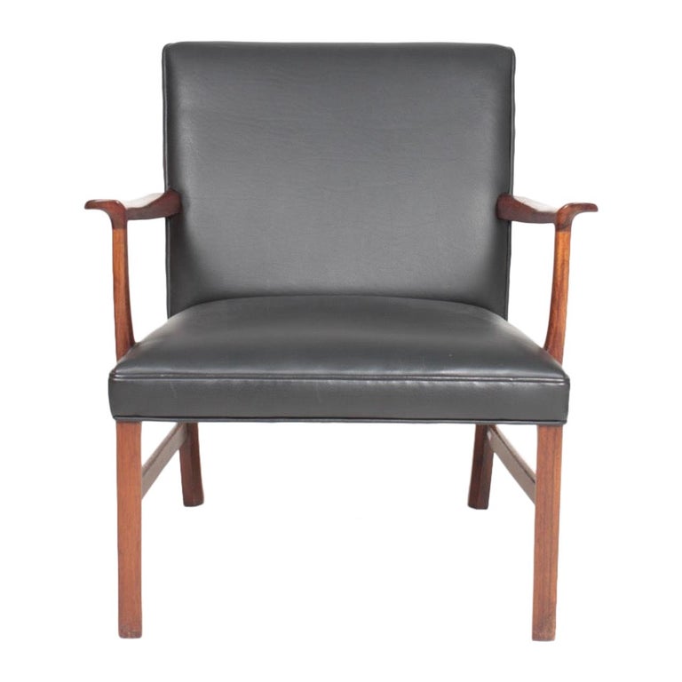 Midcentury Lounge Chair in Rosewood and Leather by Wanscher, Danish Design 1950s For Sale