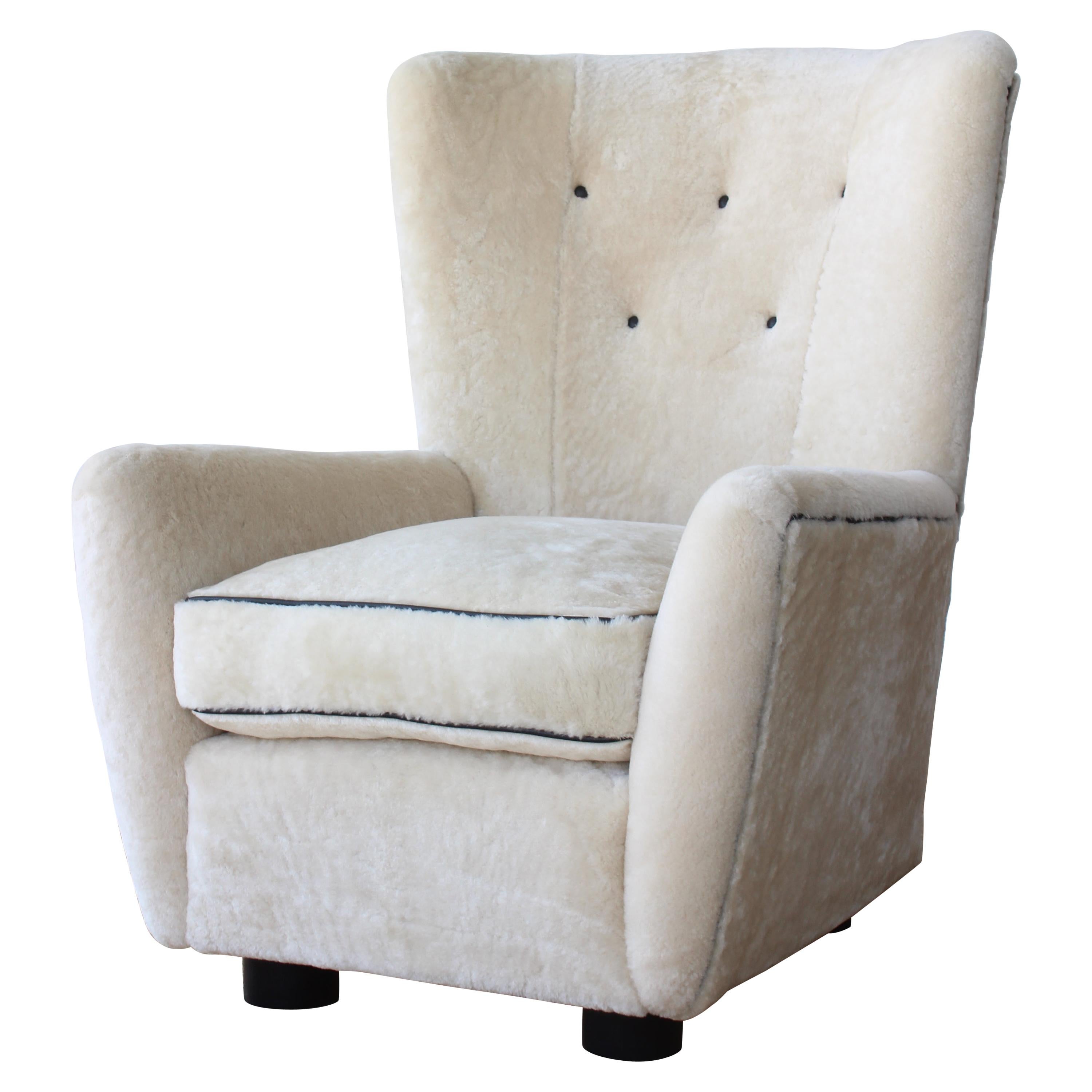 Mid Century Lounge Chair aus Schafsleder:: Frankreich:: 1950er Jahre