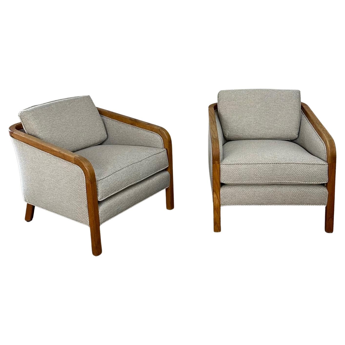 W28 D32 H25.5 SW23 SD20 SH18 AH23

Pair of fully restored lounge chairs with fresh tweed upholstery. Thick thick soft woven tweed shows in excellent condition with no rips or stains. Chair have very nice wooden frames with nice joinery and that