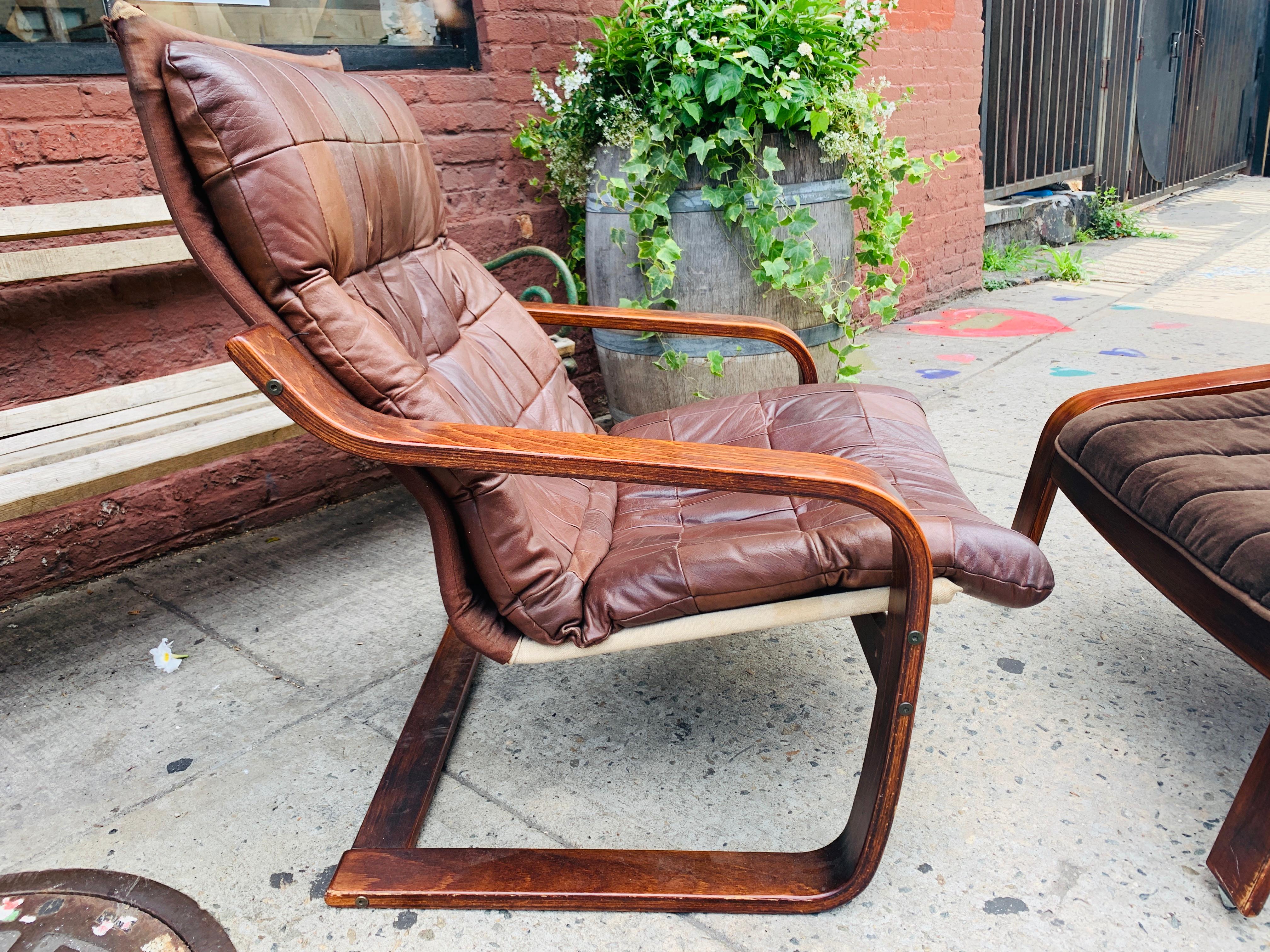 mid century lounge chair and ottoman
