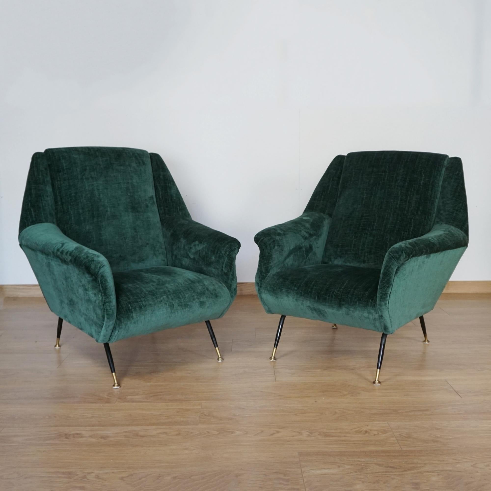 A pair of Mid-Century lounge chairs. Original brass capped feet with green fabric re-upholstery. Attributed to Gigi Radice for Minotti.

Dimensions: H 90cm W 85cm D 72cm Seat H 37cm W 48cm D 50cm

Origin: Italian

Date: Circa 1950

Item Number: